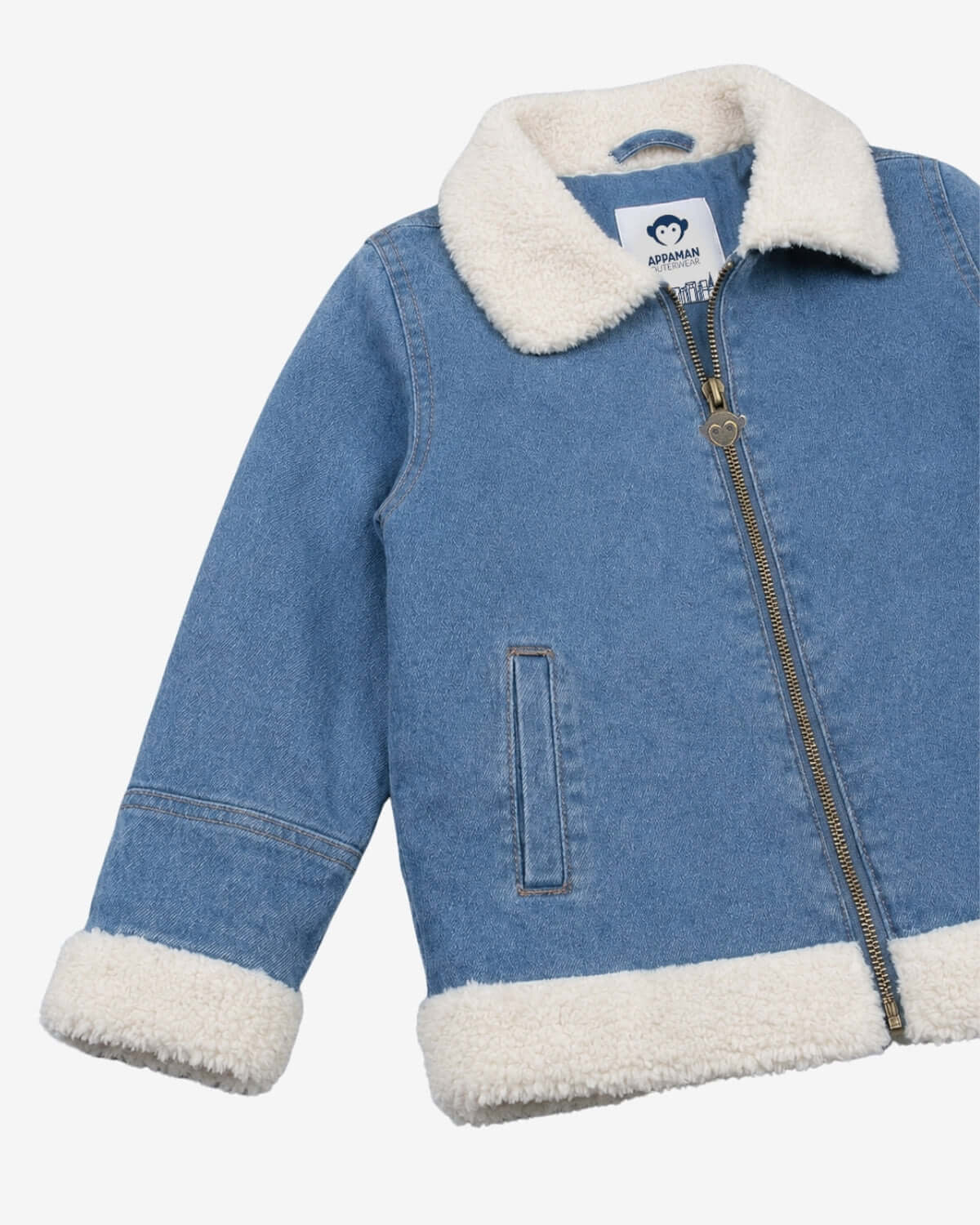 Blue denim jacket with white fur lining on a white background
