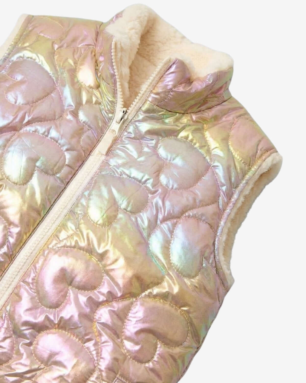 Iridescent puffer vest on a white background