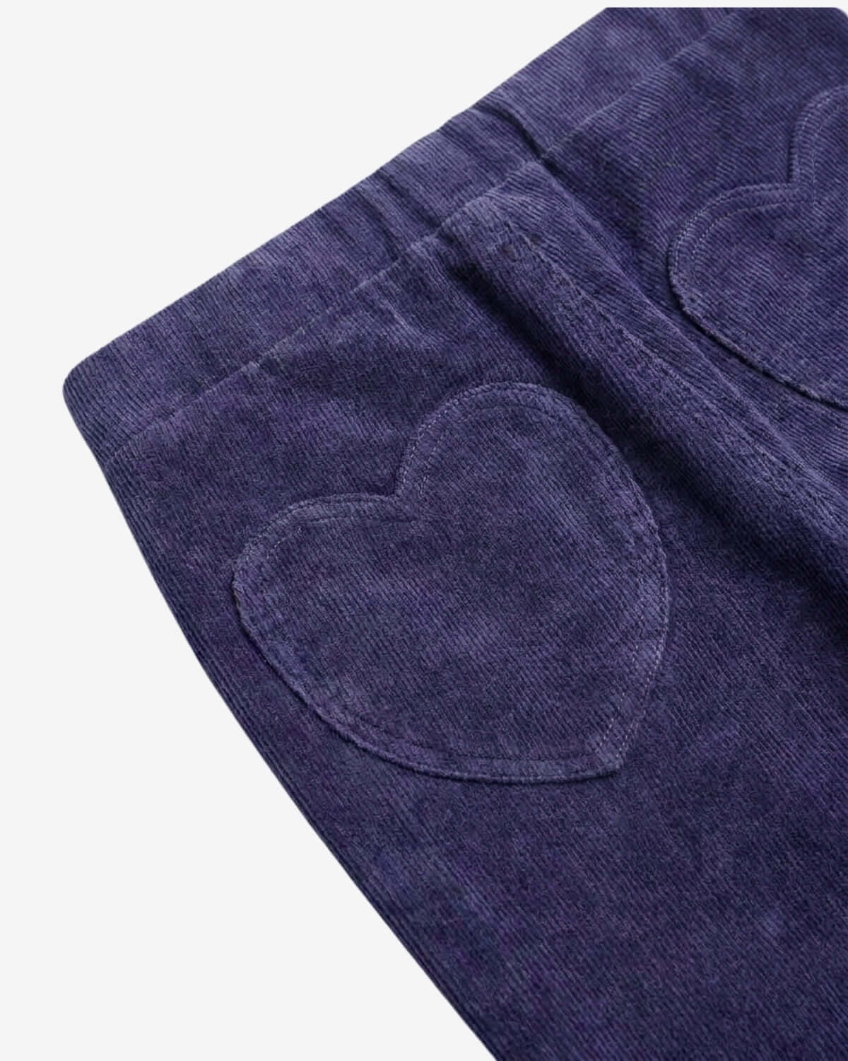 Navy blue fabric with heart shapes on a white background