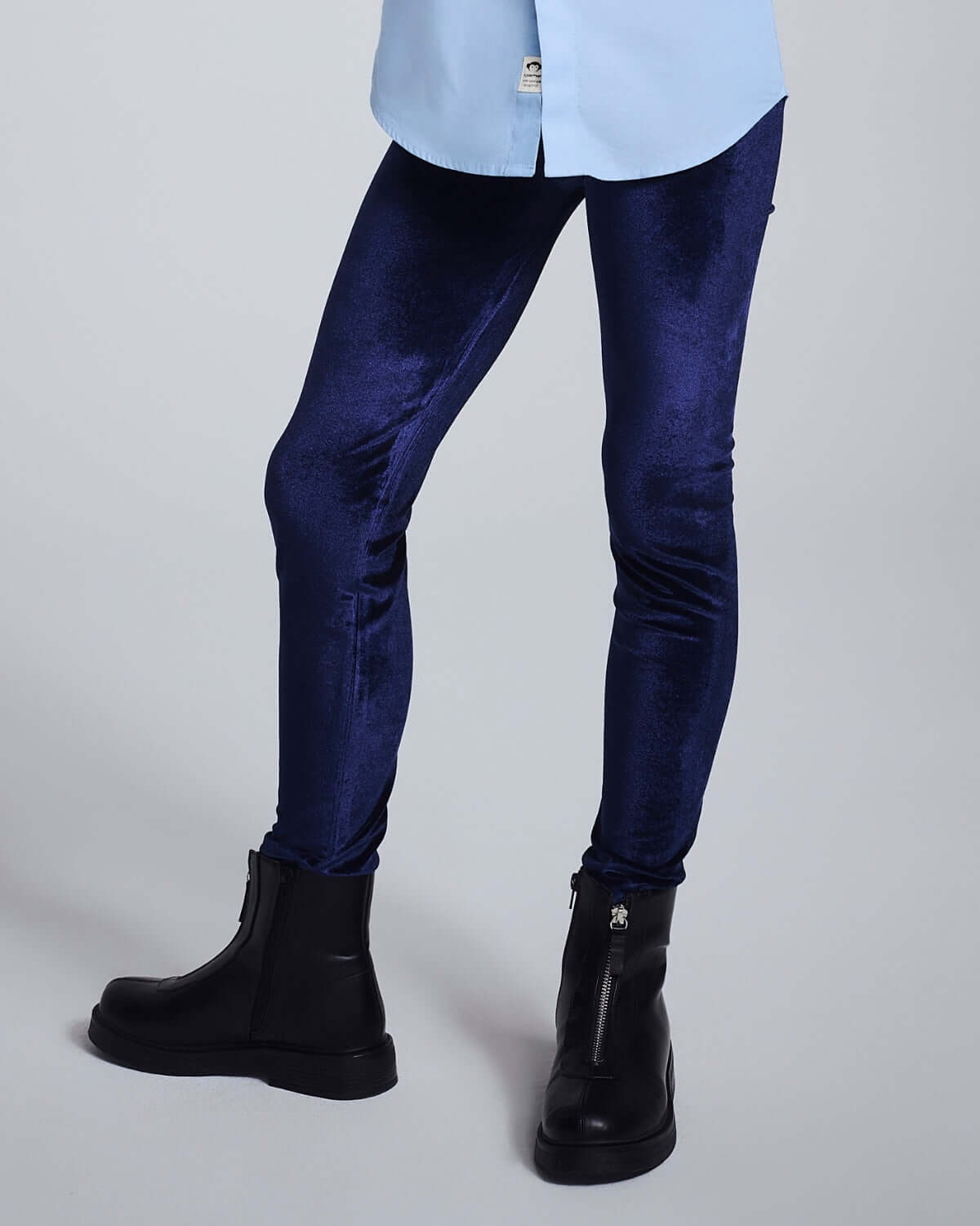 Navy Twilight Leggings showcased on a child wearing black boots and a light blue top, highlighting comfort and style.