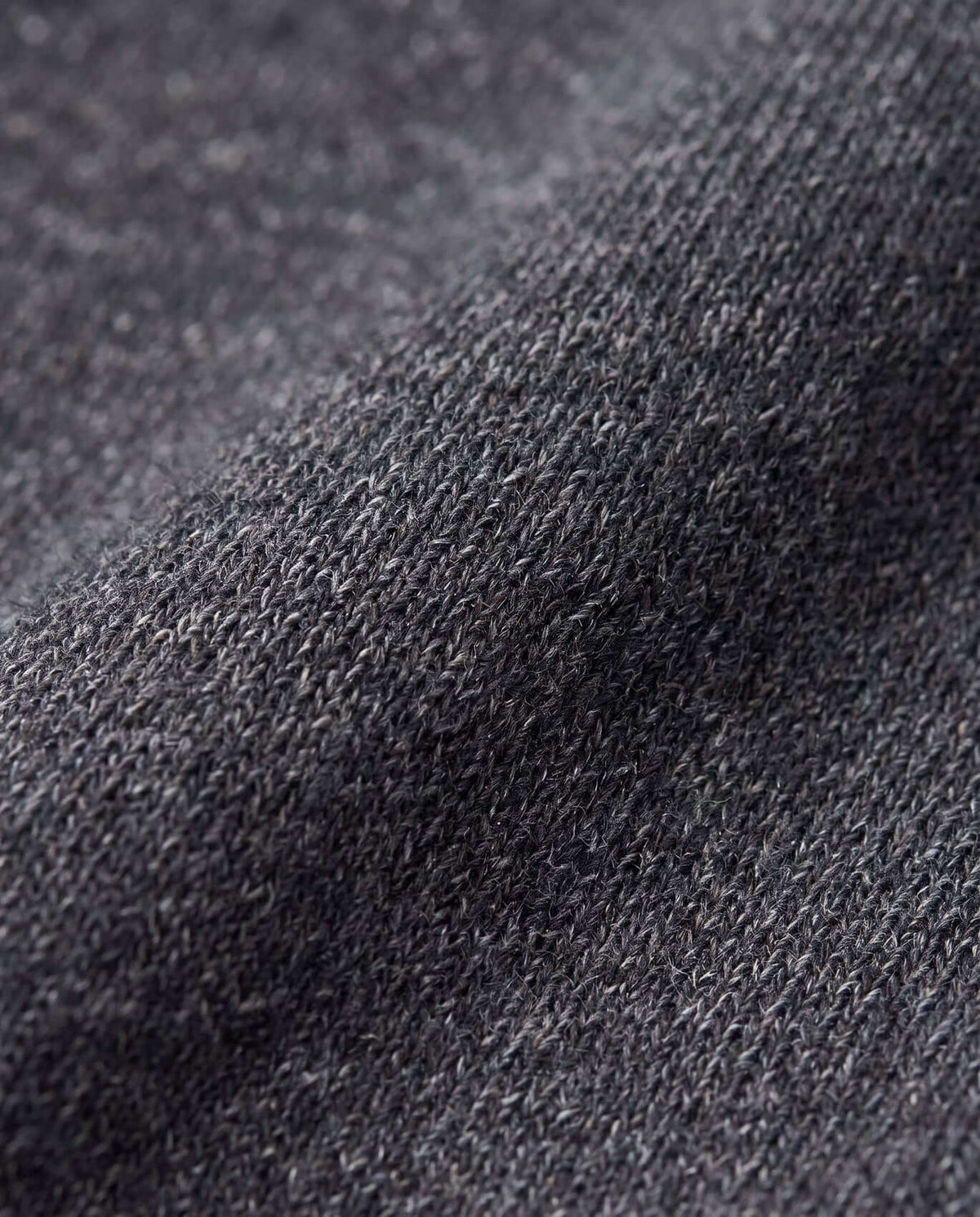 Close-up of Black Glitter Lily Seamed Sweatpants fabric showcasing soft texture and glitter finish, perfect for active kids.