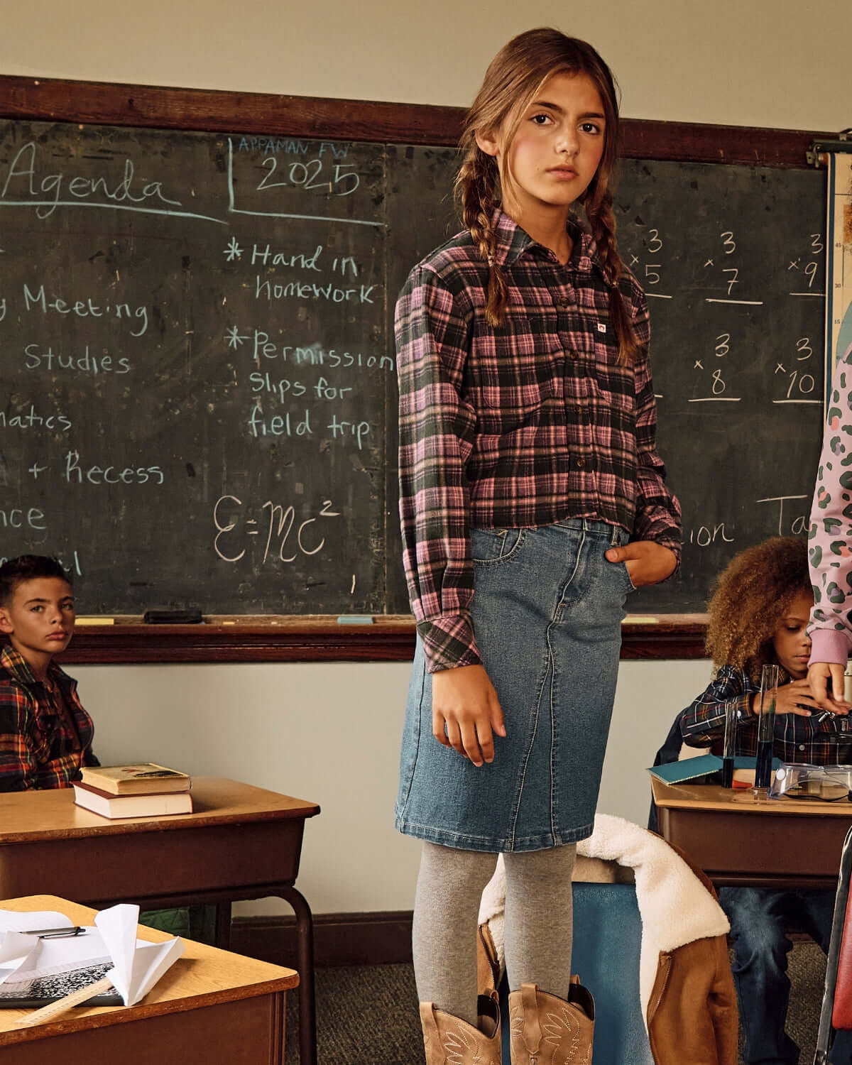 Child wearing a Midi Denim Skirt in a classroom setting, showcasing style and comfort for all-day play.