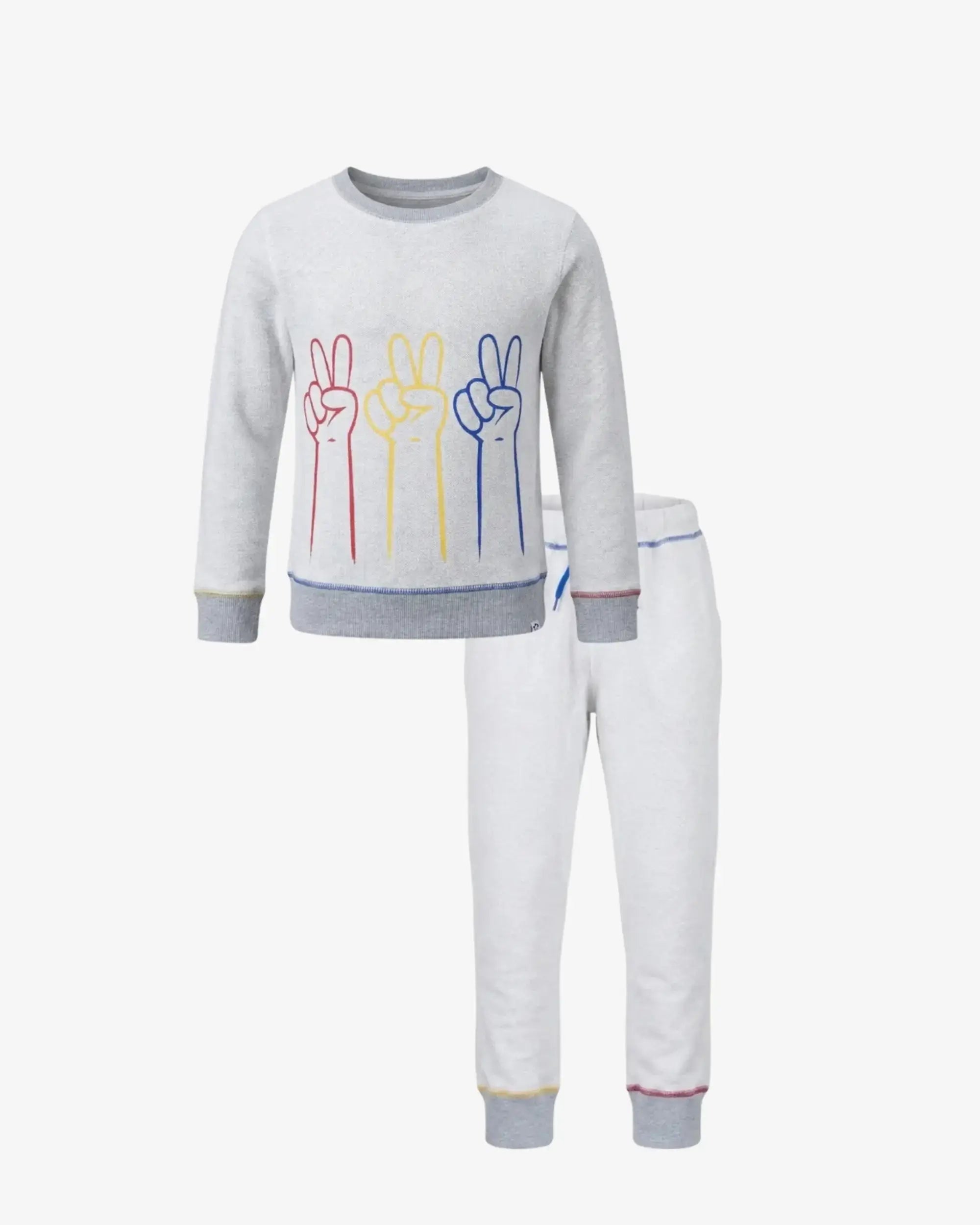 A children's two-piece knit pajama set featuring a light gray long-sleeve top with a colorful peace sign graphic and matching white pants with gray cuffs.