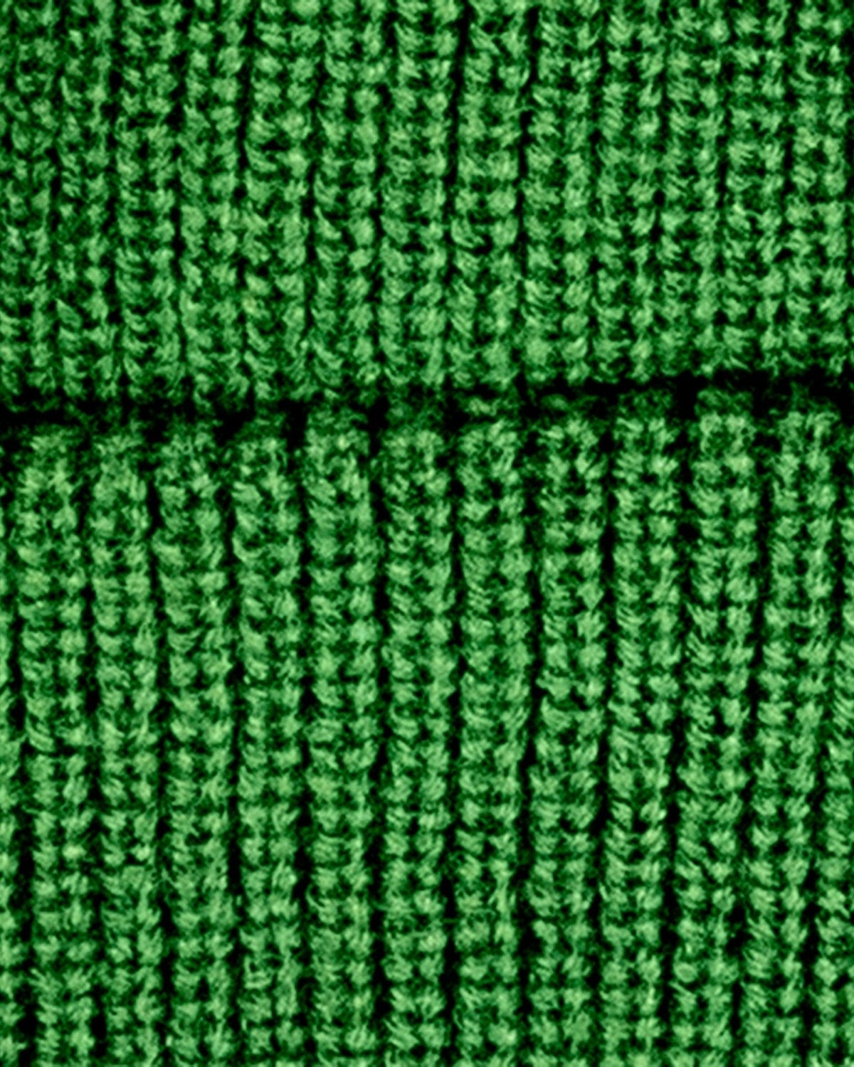 Cozy hunter green knit texture of the slouchy Haze Hat—perfect for stylish kids ready for winter adventures!