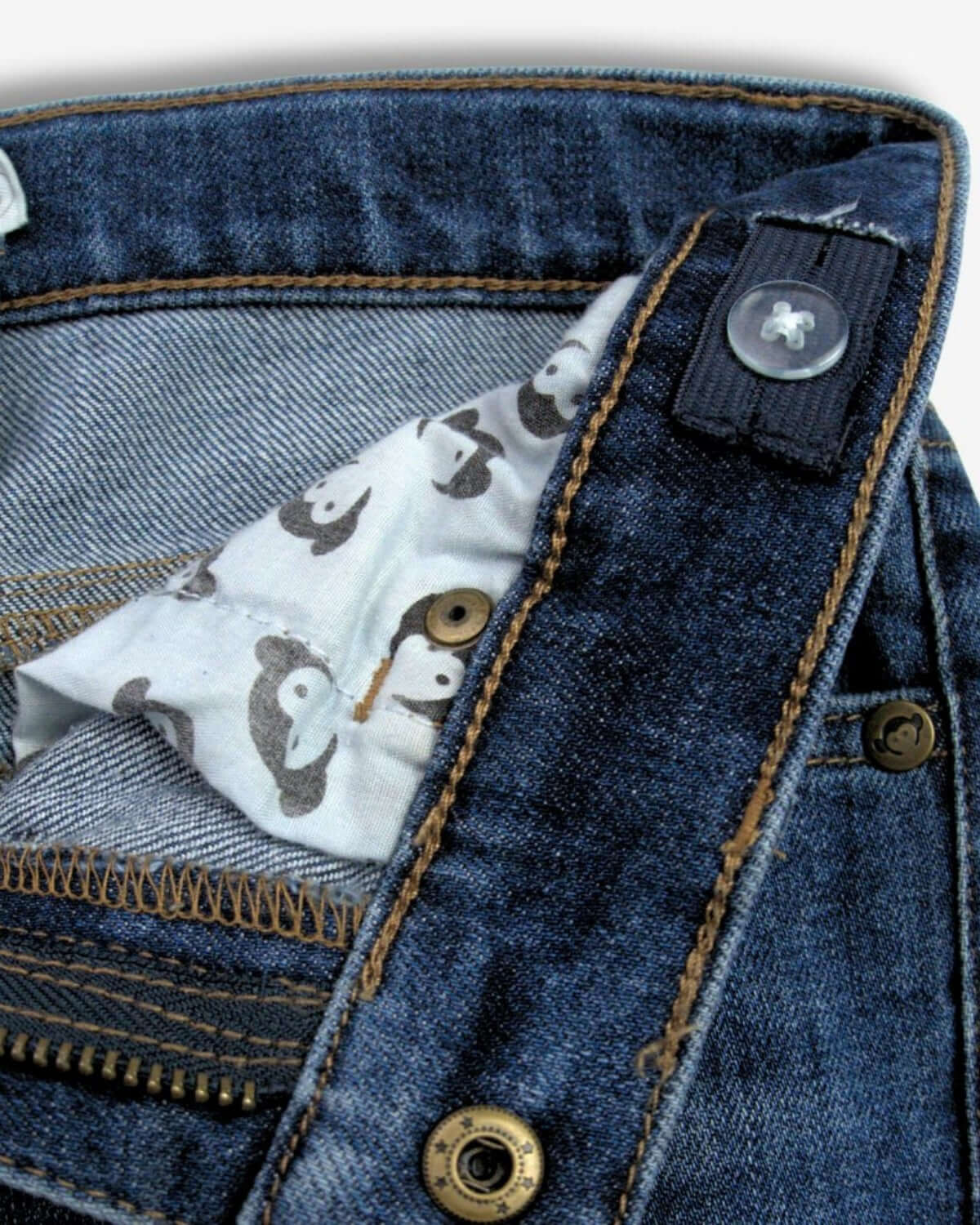 Close-up of Medium Wash Slim Leg Denim showing stylish interior fabric detail.