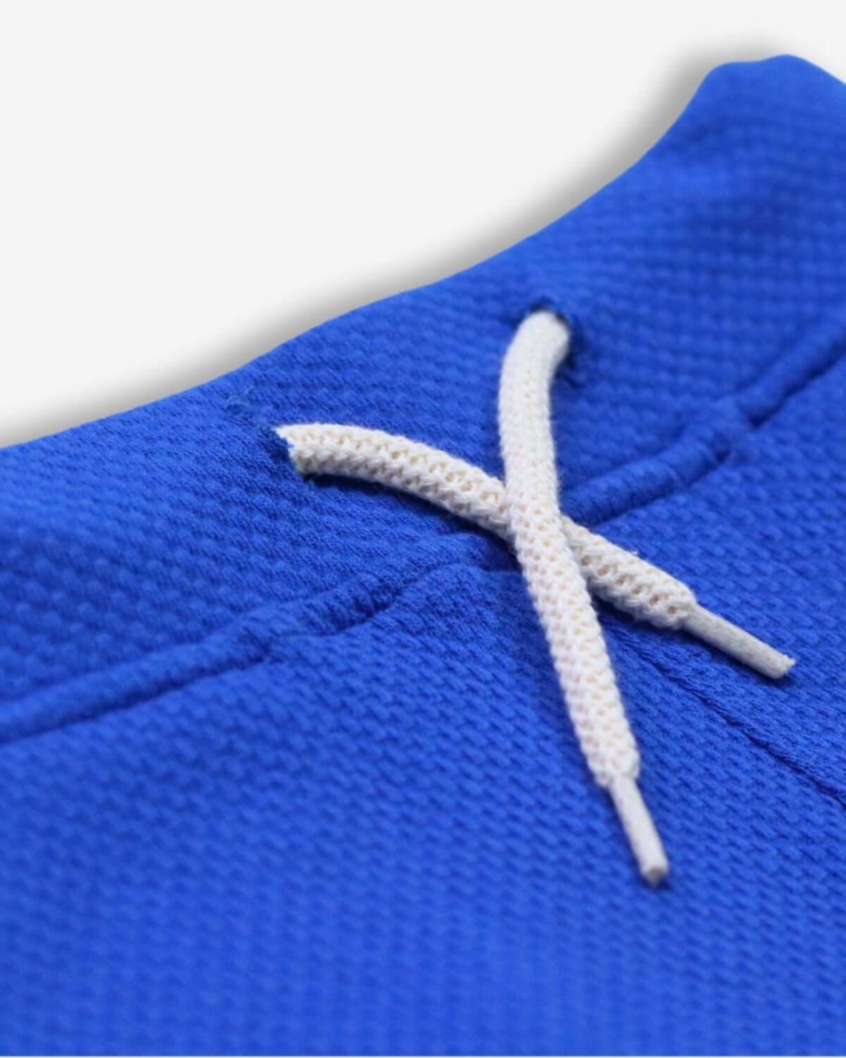 Close-up of Nautical Blue Preston Shorts showcasing soft fabric and stylish drawstring, perfect for kids' active days.