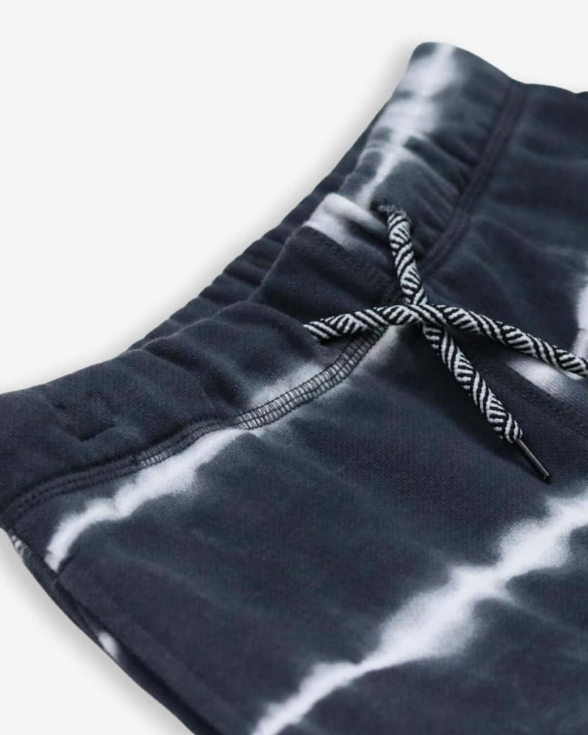 Close-up of trendy boys' Shadow Stripe Camp Shorts, showcasing the stylish tie-dye pattern and adjustable waistband.