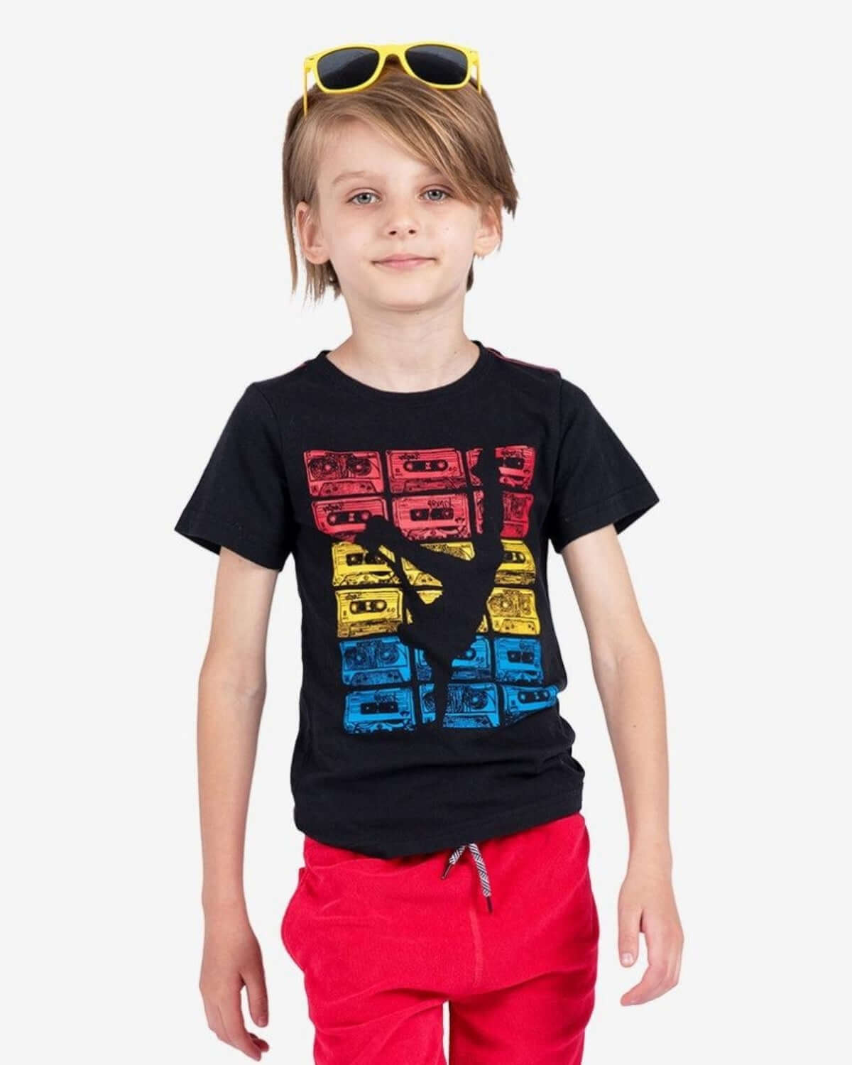 B-Boy Graphic Tee featuring a break dancer and colorful boom box design on a child model.