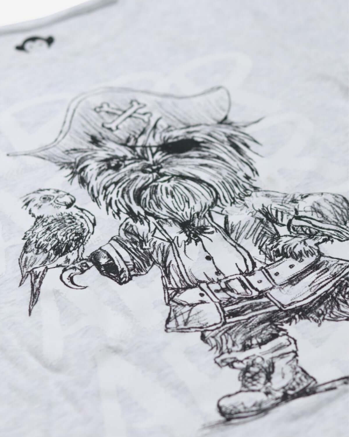 Whimsical pirate pup graphic on a soft tee, perfect for adventurous kids' wardrobes.