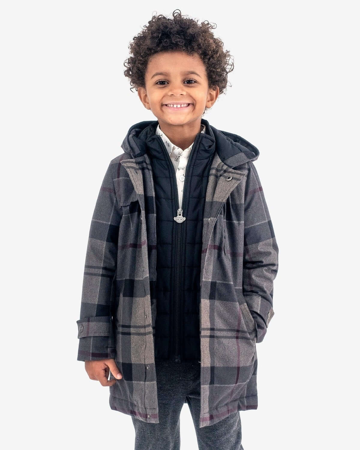 Boy wearing Grey Plaid New Gotham Coat, featuring a stylish plaid design and cozy hood.