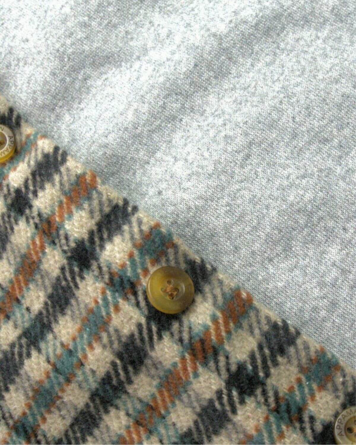 Close-up of Beige/Teal Check Glen Hooded Shirt's cozy fabric and buttons—stylish kids clothes for little adventurers!