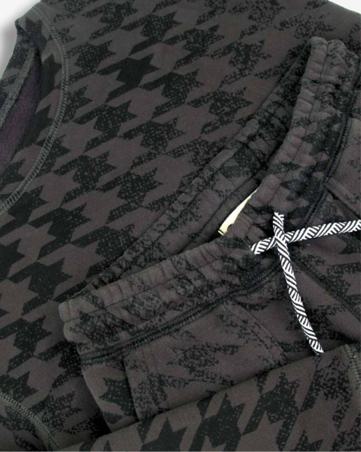 Stylish Black Houndstooth Revel Crewneck showcasing high-quality kids' clothes, ideal for back-to-school chic.