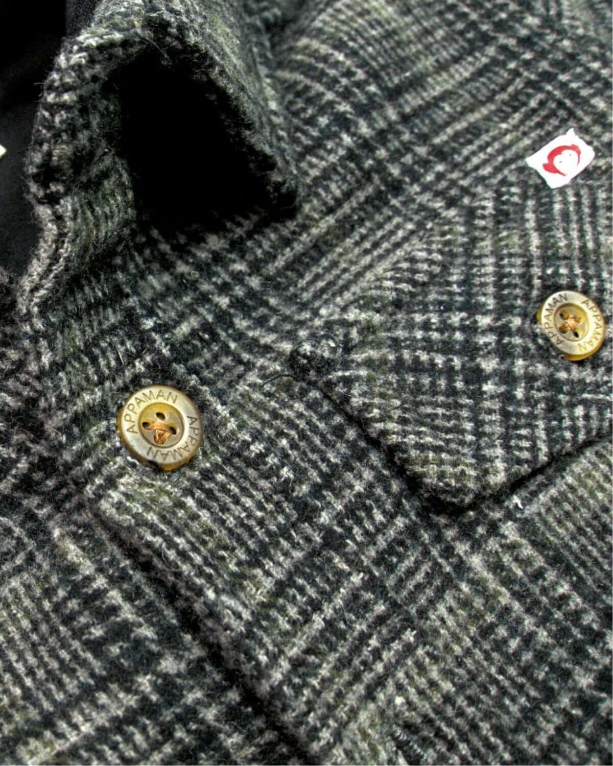 Close-up of Black/Moss Plaid Glen Hooded Shirt, showcasing quality fabric and stylish button details for kids' back-to-school outfits.