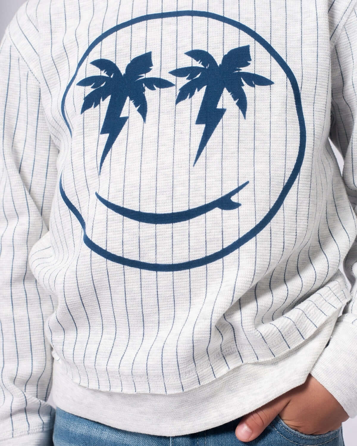 Bright and playful sweatshirt with palm tree happy face, perfect for stylish kids' adventures!