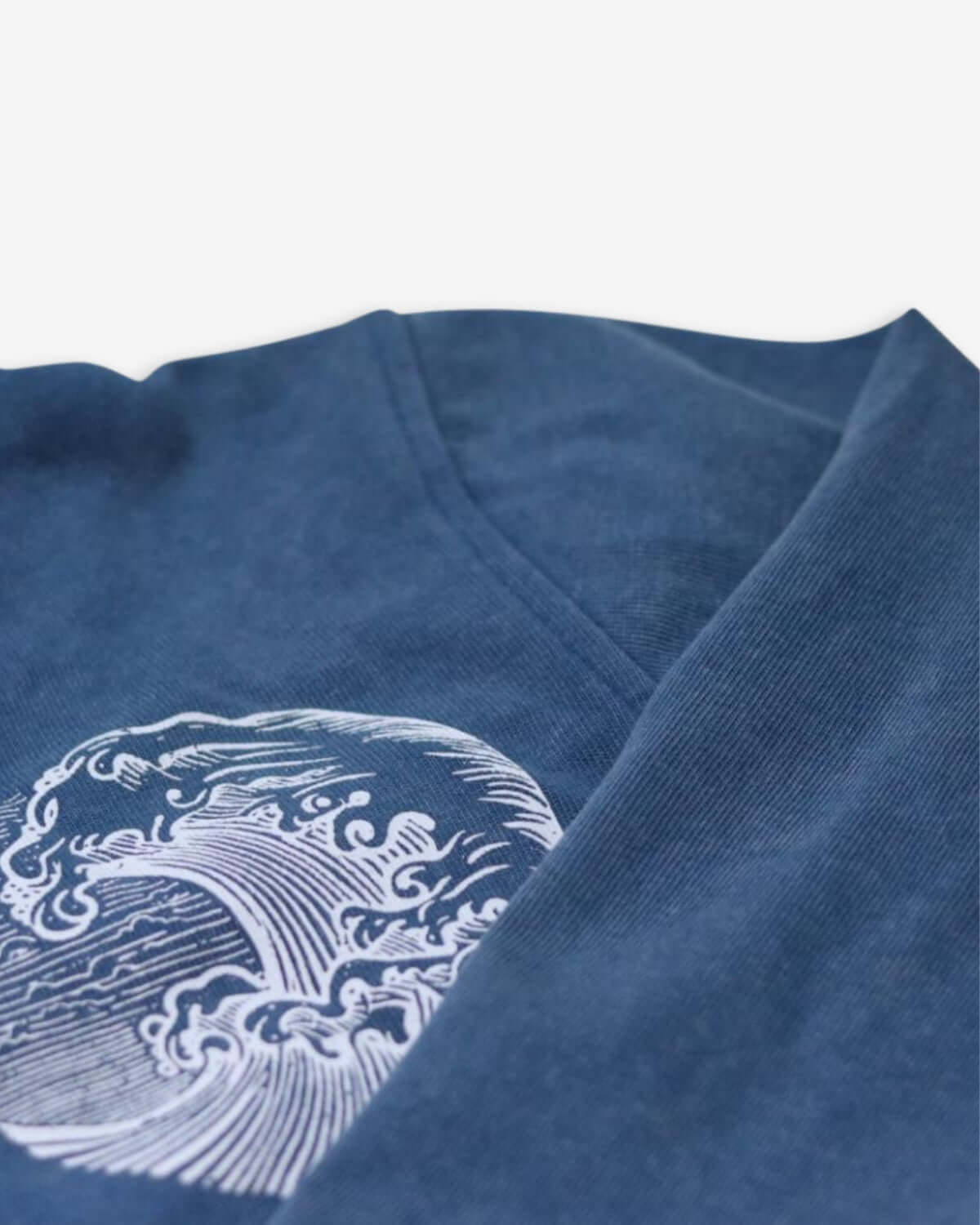 Close-up of Waves/Surf Bike Strivers Hoodie in sunwashed blue, highlighting stylish wave design—ideal kids clothes for adventure!