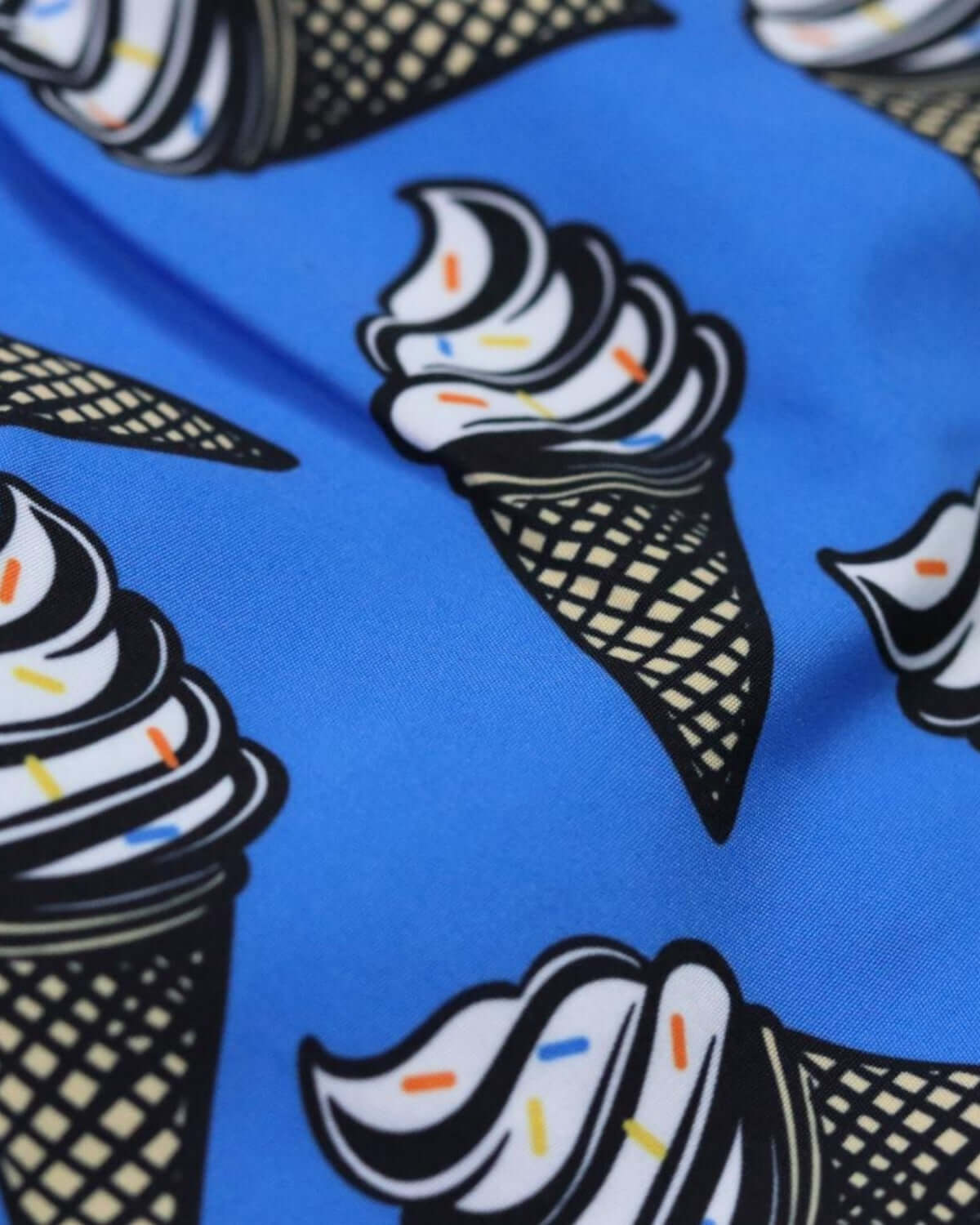 Colorful ice cream cone pattern on Appaman's swim trunks—fun, stylish kids' clothes for sunny days!