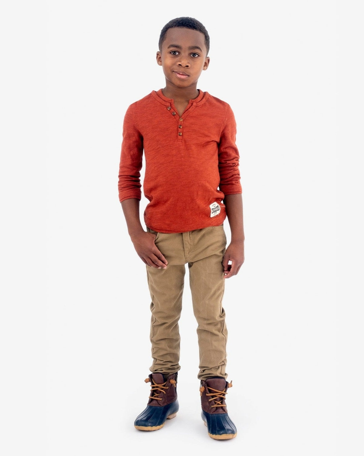 Stylish little boy in Arabian Spice Camden Henley, ready for back to school in high-quality kids clothes.