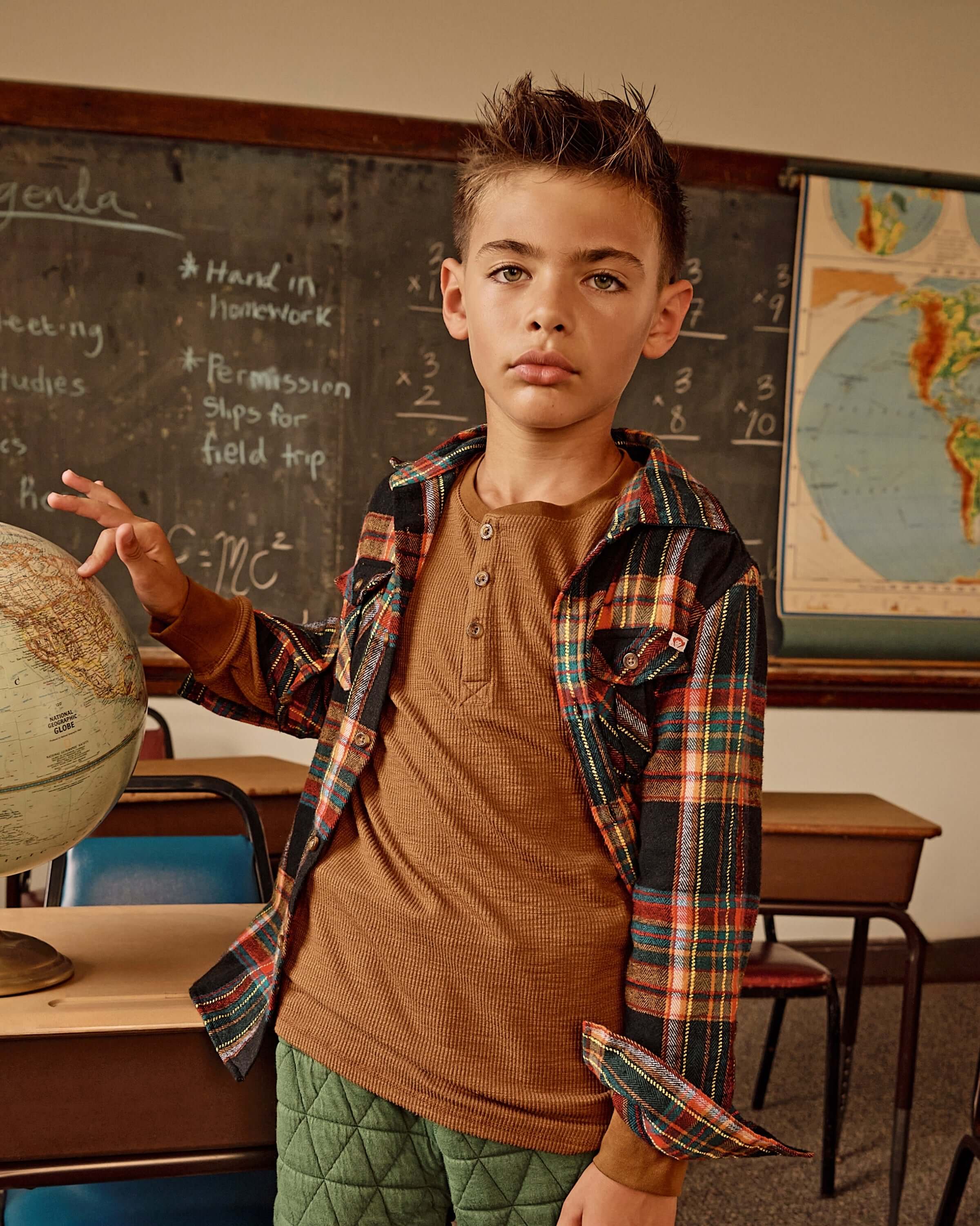 Cool kid in British Khaki Craftsman Thermal Henley, perfect for back-to-school adventures and exploring the world!