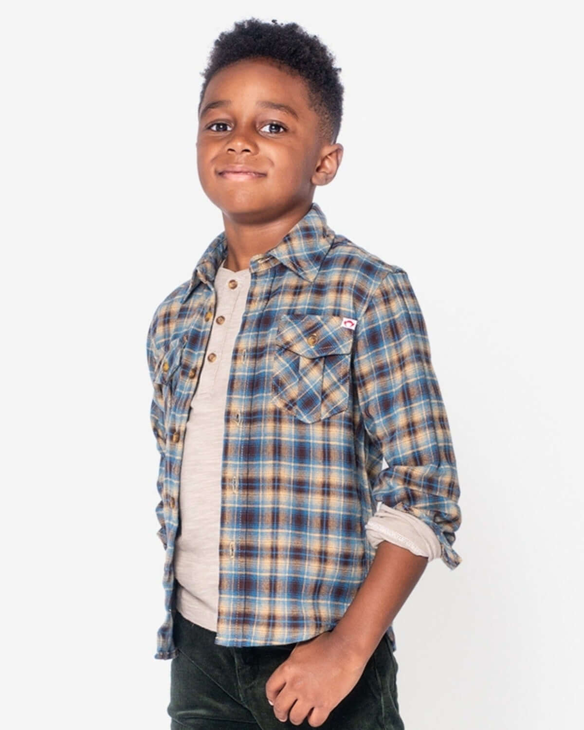 Cool boy rocking a Chocolate/Blue Plaid Flannel Shirt, perfect for stylish kids’ outfits!