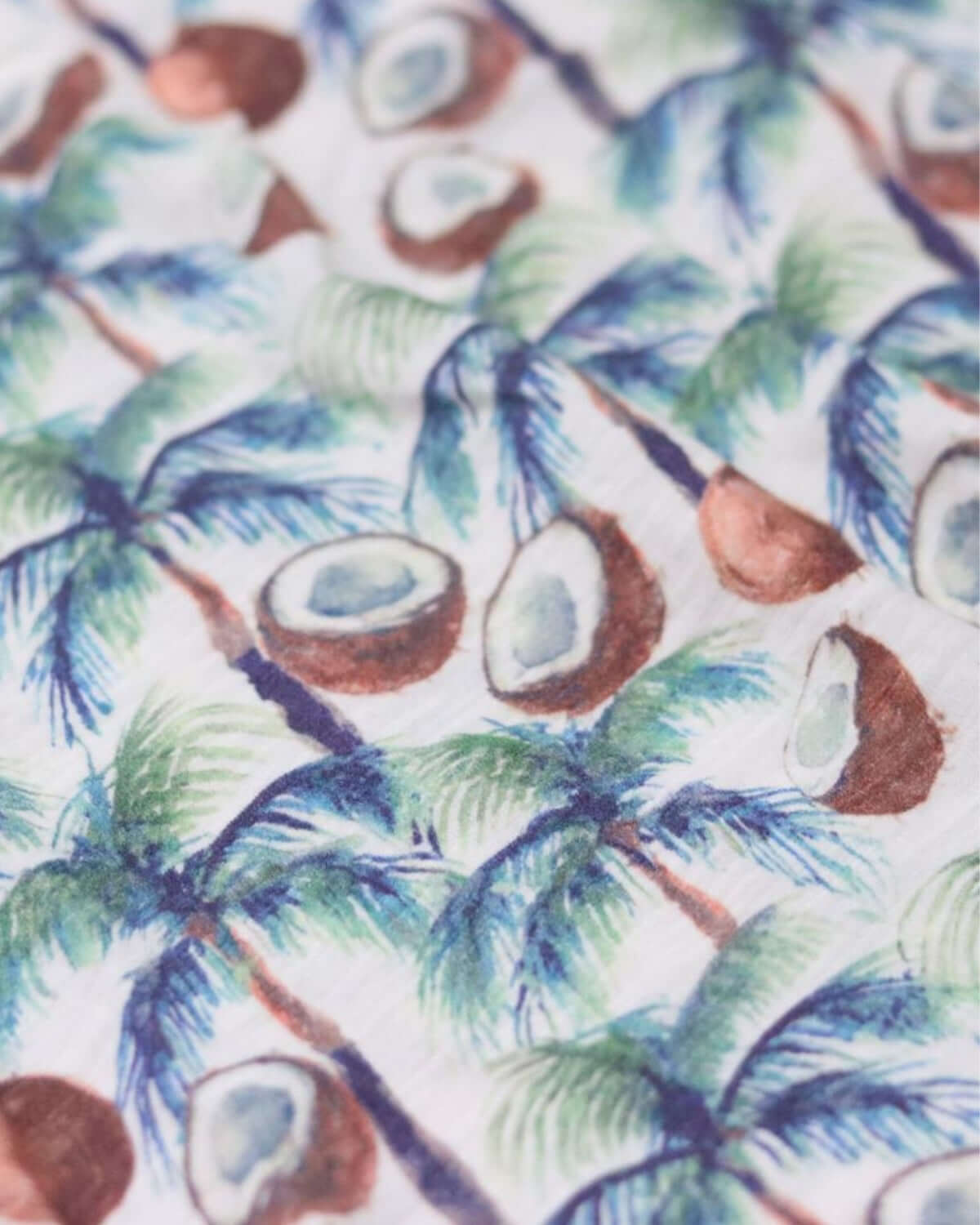 Vibrant coconut and palm leaf pattern showcasing a tropical vibe—ideal for stylish kids clothes from Appaman!