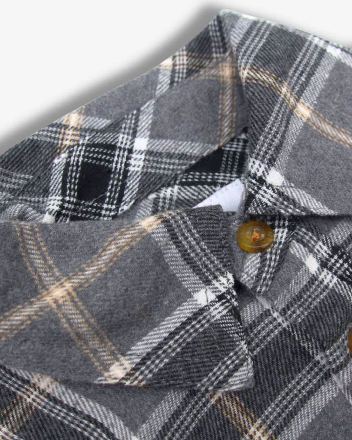 Cozy greige plaid flannel shirt collar, perfect for stylish kids’ fall adventures in high-quality durable fabric.