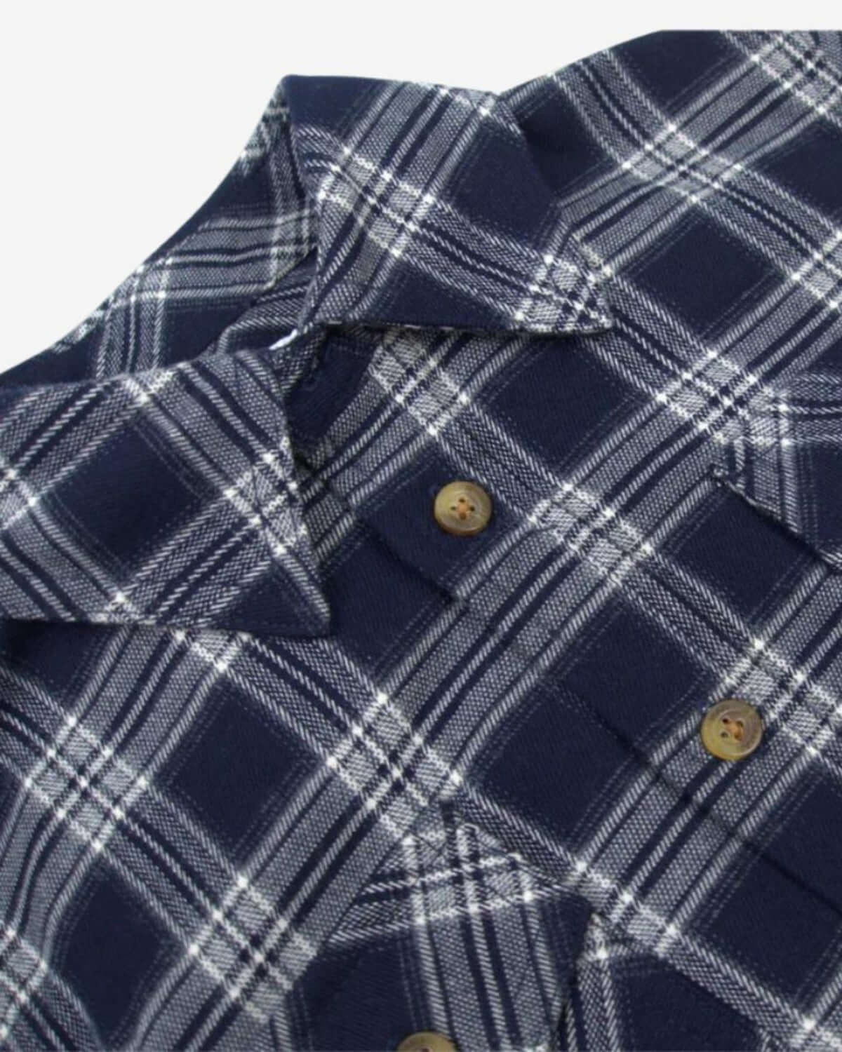 Stylish navy plaid flannel shirt—soft, cozy, and perfect for crisp autumn days spent apple picking!