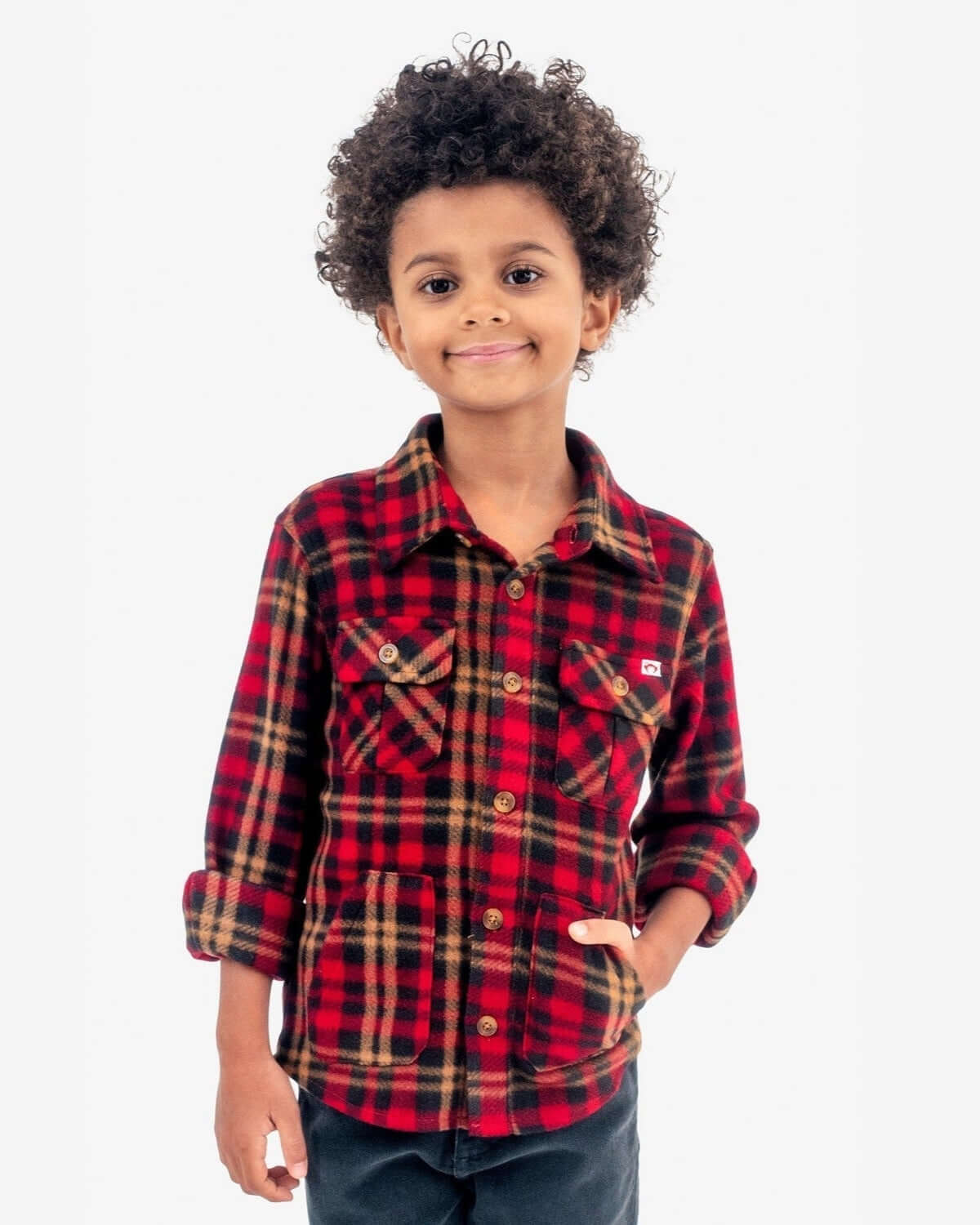 Rio Red Plaid Snow Fleece Shirt worn by a child, showcasing its stylish design and warm fleece material.