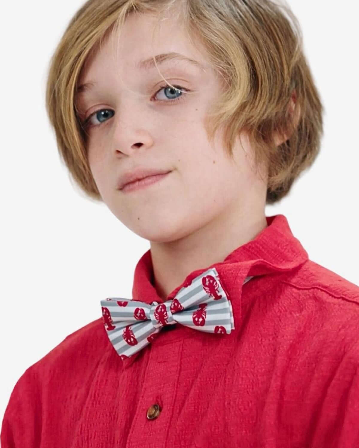 Stylish kid rocking a Lobster Stripe Bow Tie, adding a fun twist to back-to-school outfits in high-quality boys clothes.