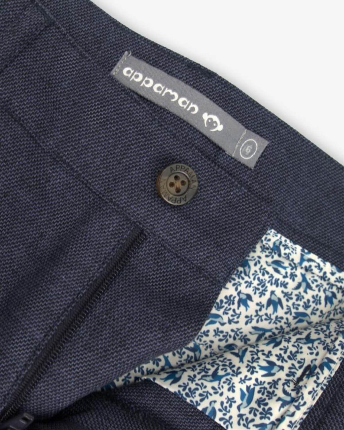 Blue Nights Linen Beach Pants interior detail showing fabric and button design.
