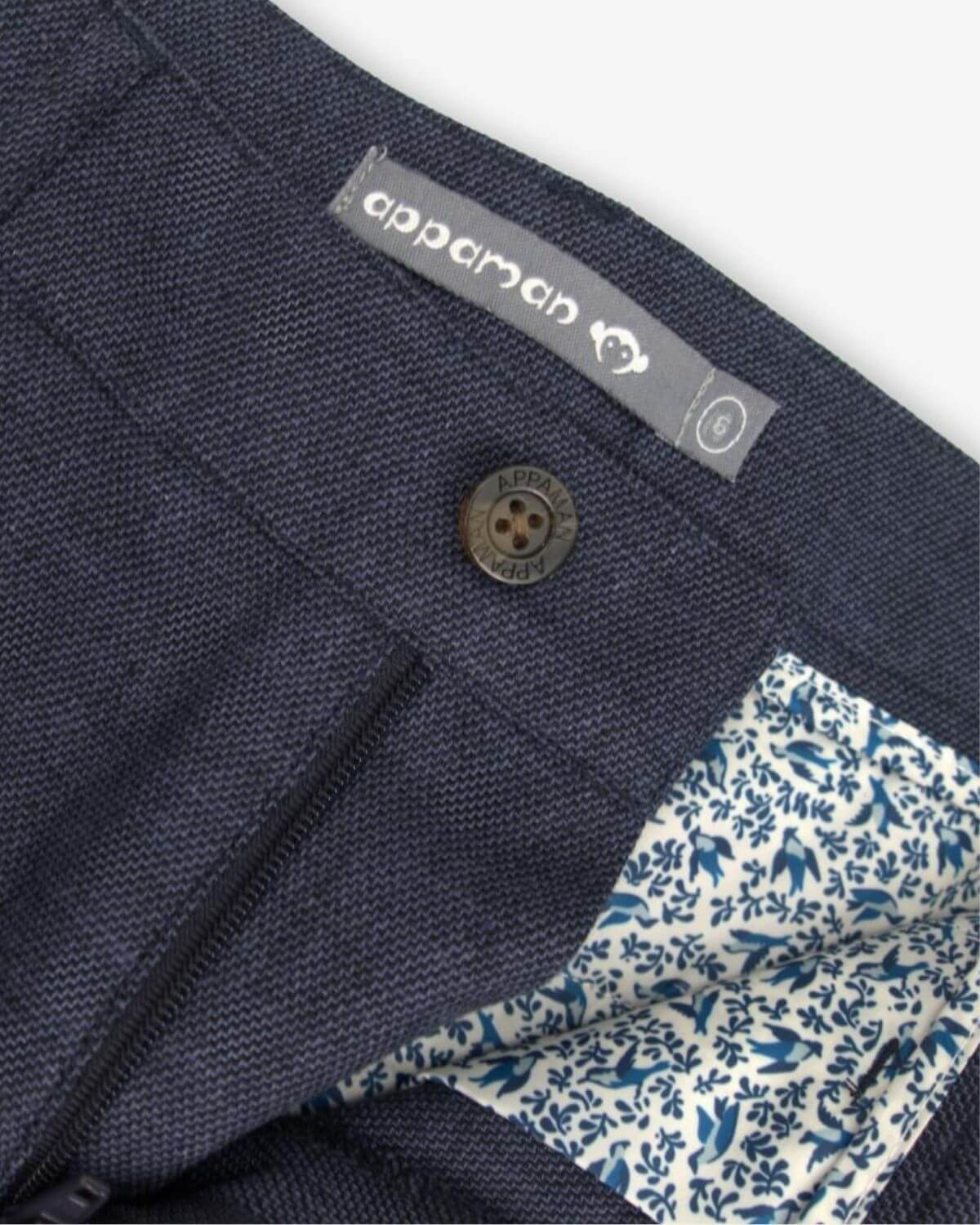 Close-up of Appaman's trendy Blue Nights Linen Trouser Short, showcasing stylish fabric and fun floral lining.