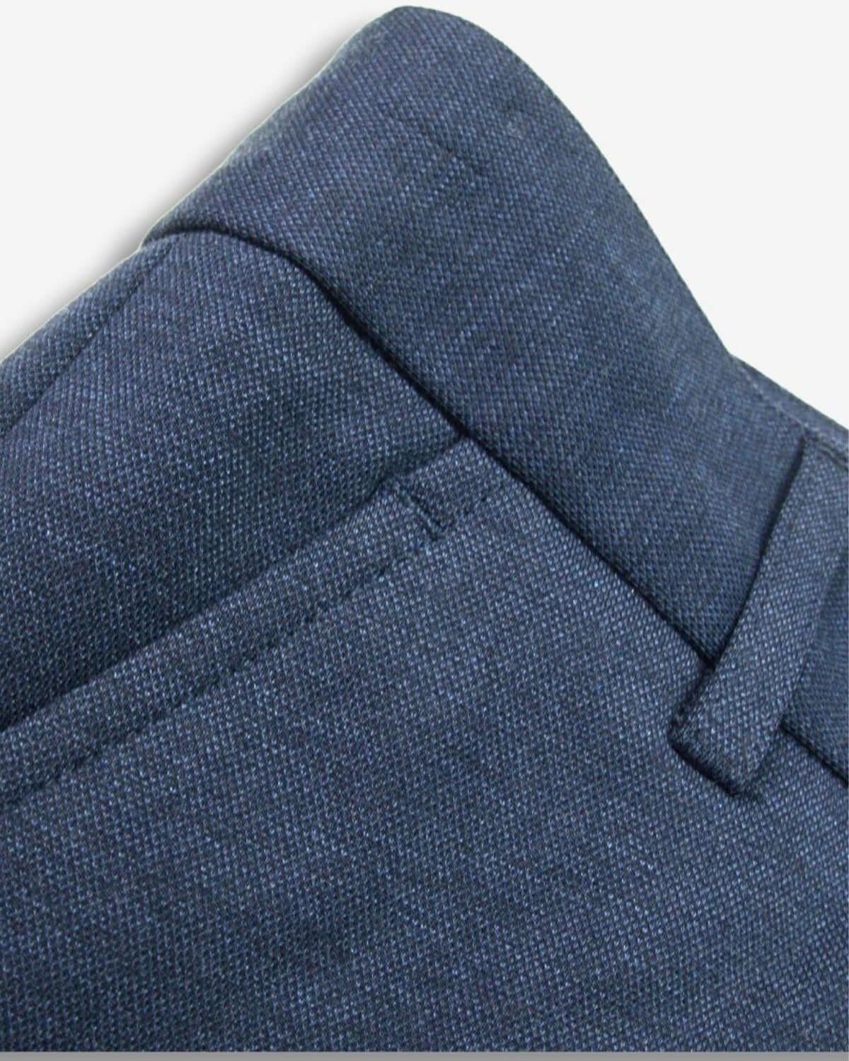 Stylish blue stretchy suit pants for kids, featuring sleek pockets and a comfy waistband—perfect for back to school!