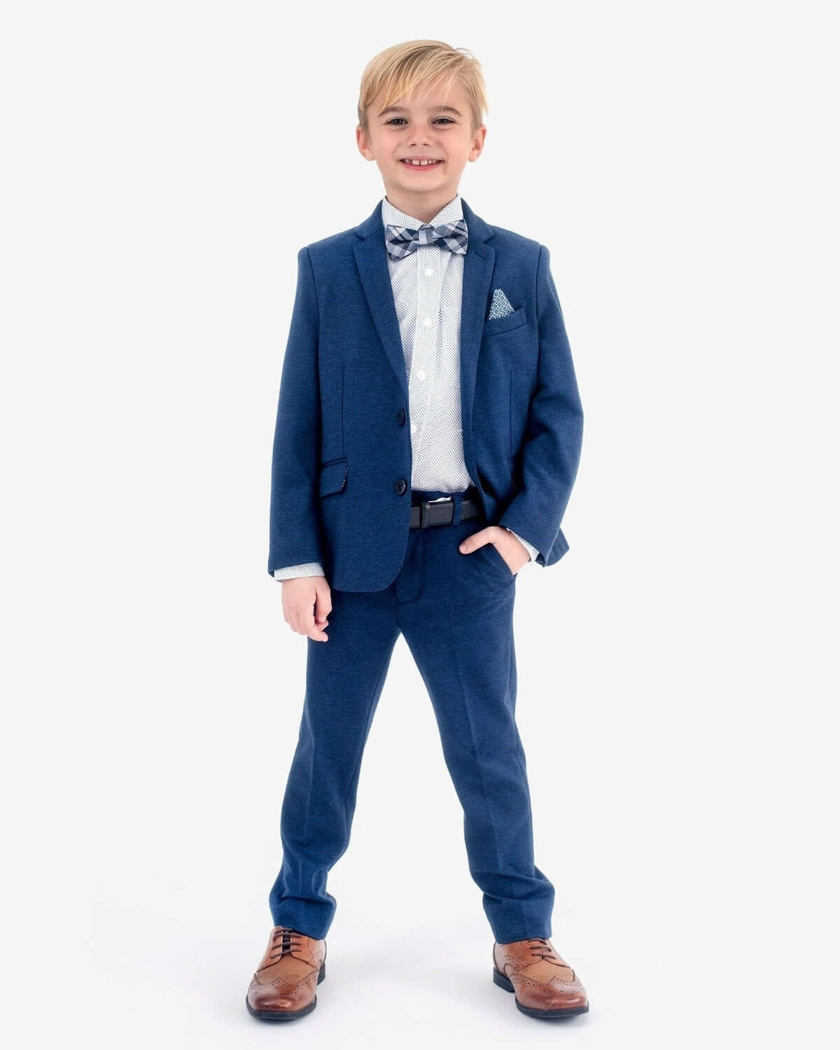 Stylish boy in boys' dress pants and blazer, perfect for back-to-school or special events, looking dapper and ready to impress!