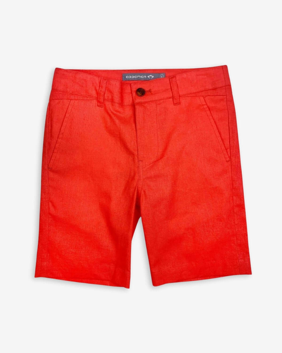 Bright coral trouser shorts for kids, stylish and comfy for summer adventures, featuring handy side pockets.