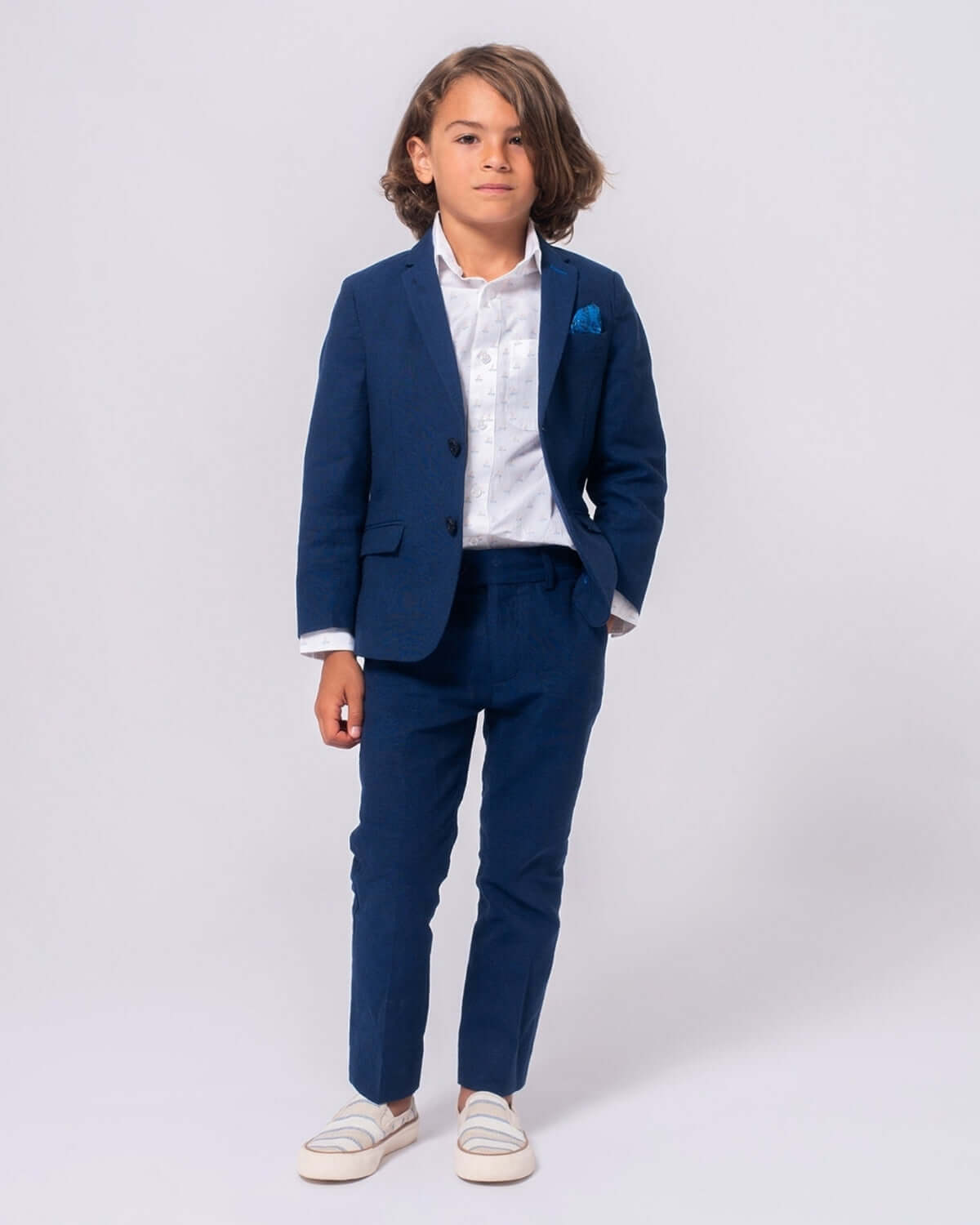 Chic boy in Estate Blue Linen Suit with stylish white shirt, ready to dazzle at any event! Perfect for kids' formal wear.