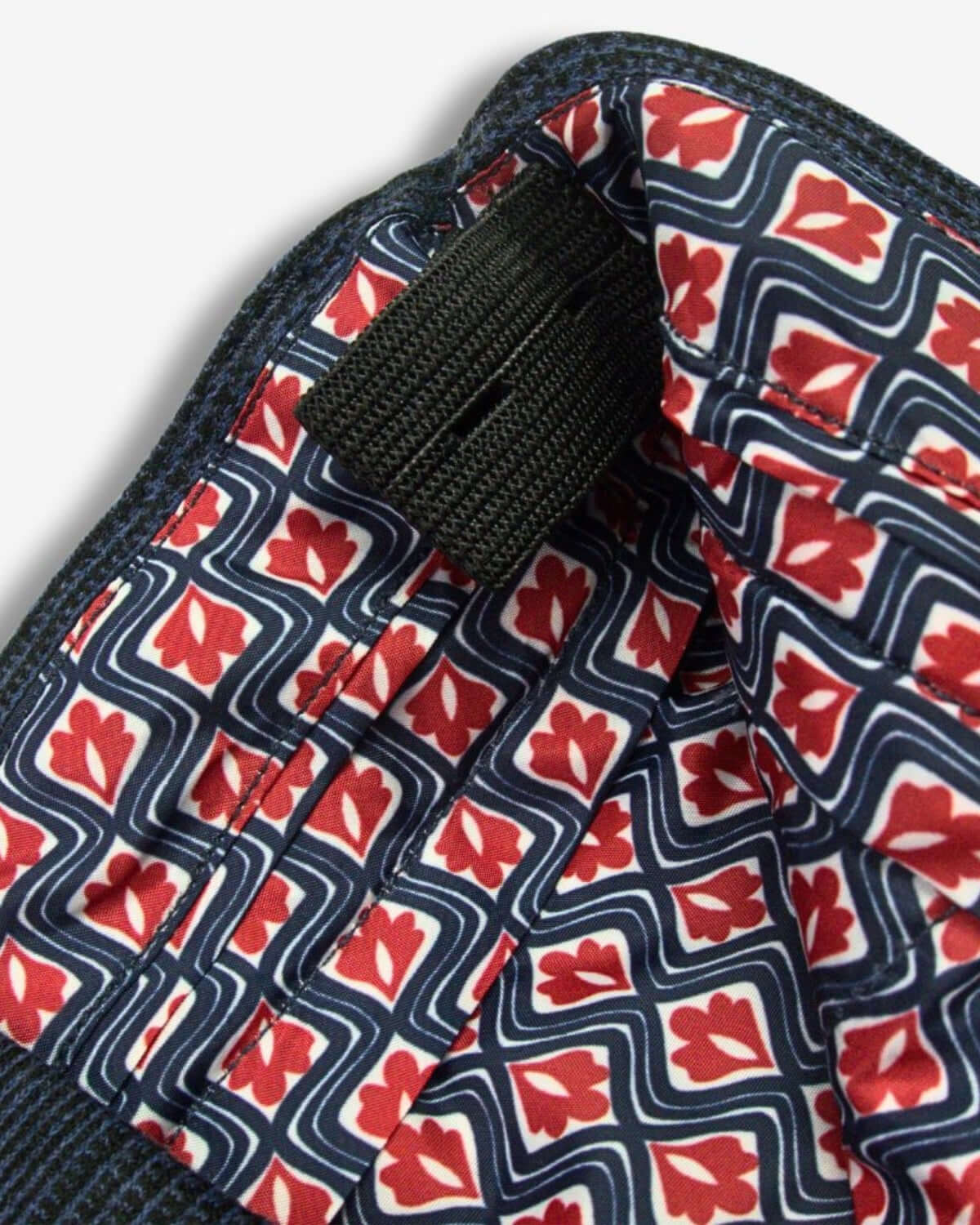 Vibrant inner lining of Indigo Wales Check Suit Pants, showcasing playful patterns—stylish and comfy for kids' dressy looks!