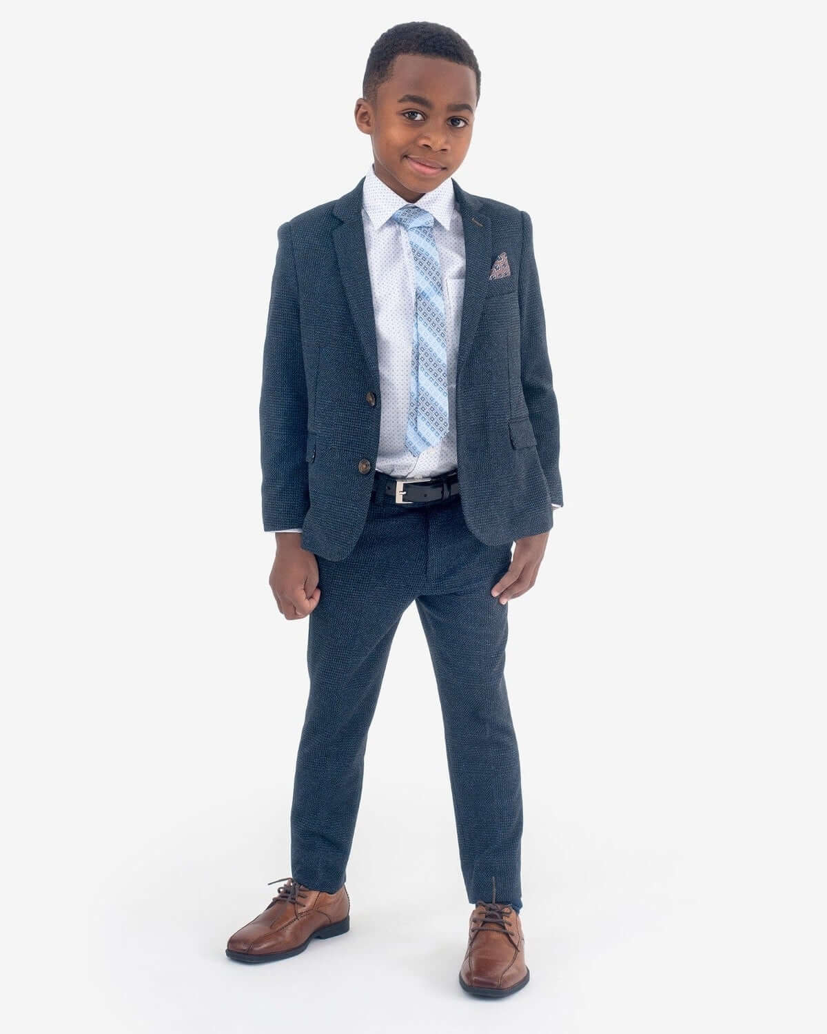 Navy Glen Plaid Stretchy Suit Pants on a stylish boy dressed for a wedding or bar mitzvah.