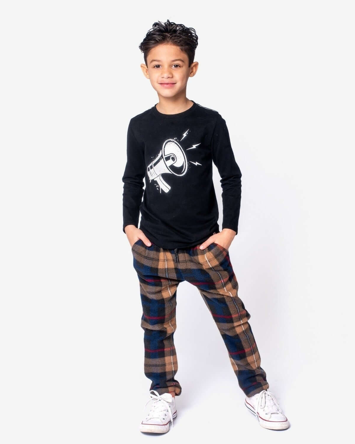 Stylish boy in navy/khaki plaid club pants, black graphic tee, ready for back to school fun!
