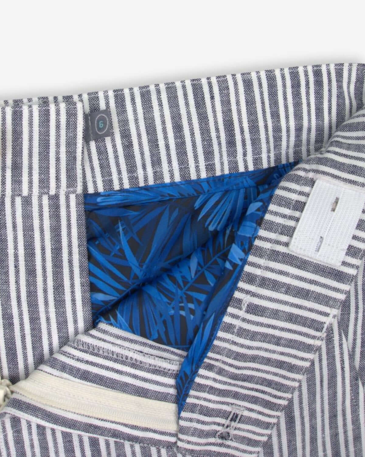 Inside view of Navy Stripe Trouser Short, showcasing vibrant blue lining and playful design—perfect for stylish kids' adventures!