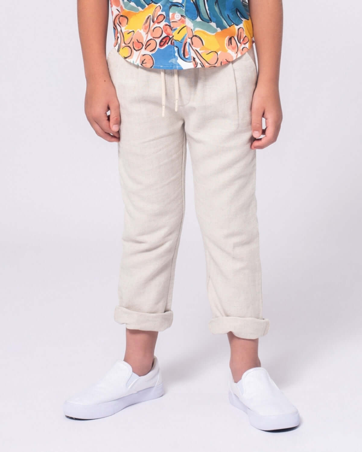 Stylish boys in lightweight sand linen resort pants, perfect for playful adventures and back-to-school days!