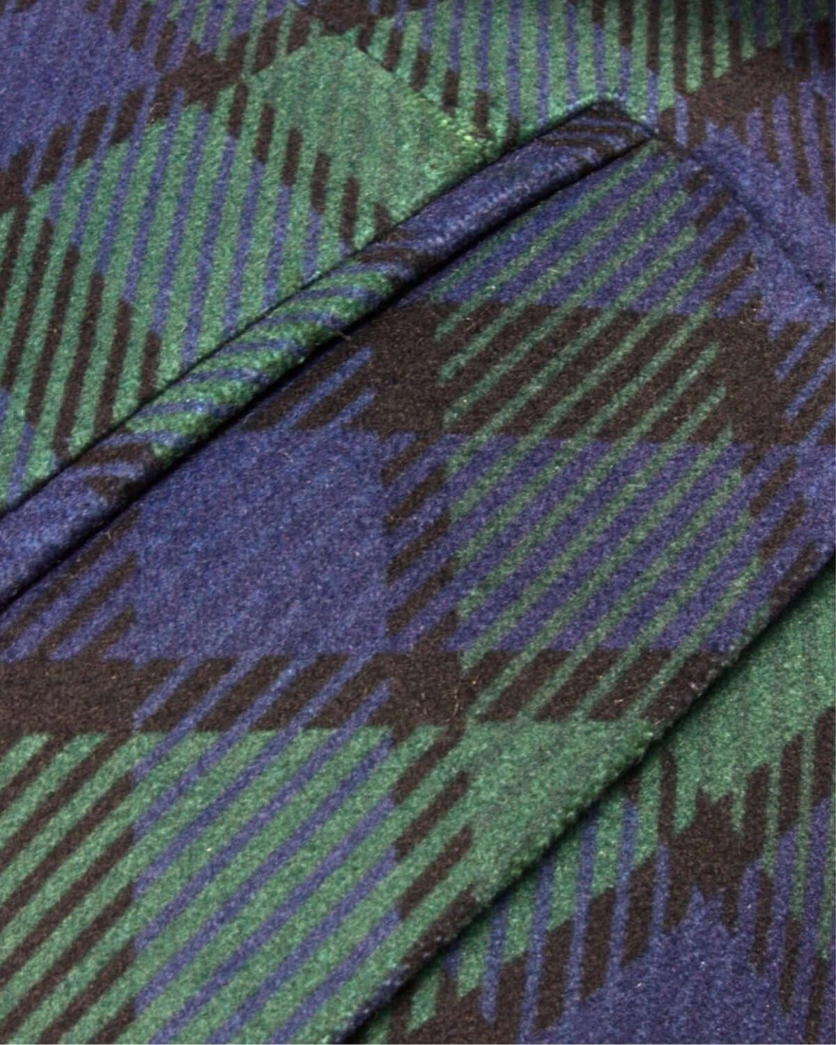 Close-up of Blackwatch Velvet Plaid fabric in vibrant blue and green, perfect for stylish kids' formal wear.