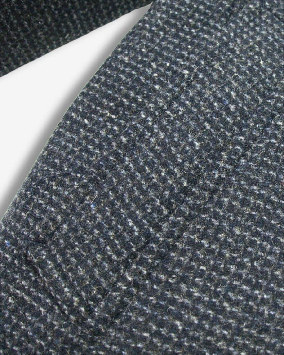 Close-up of the stylish checkered fabric on Appaman's Ink City Overcoat—durable, chic kids clothes for back to school!