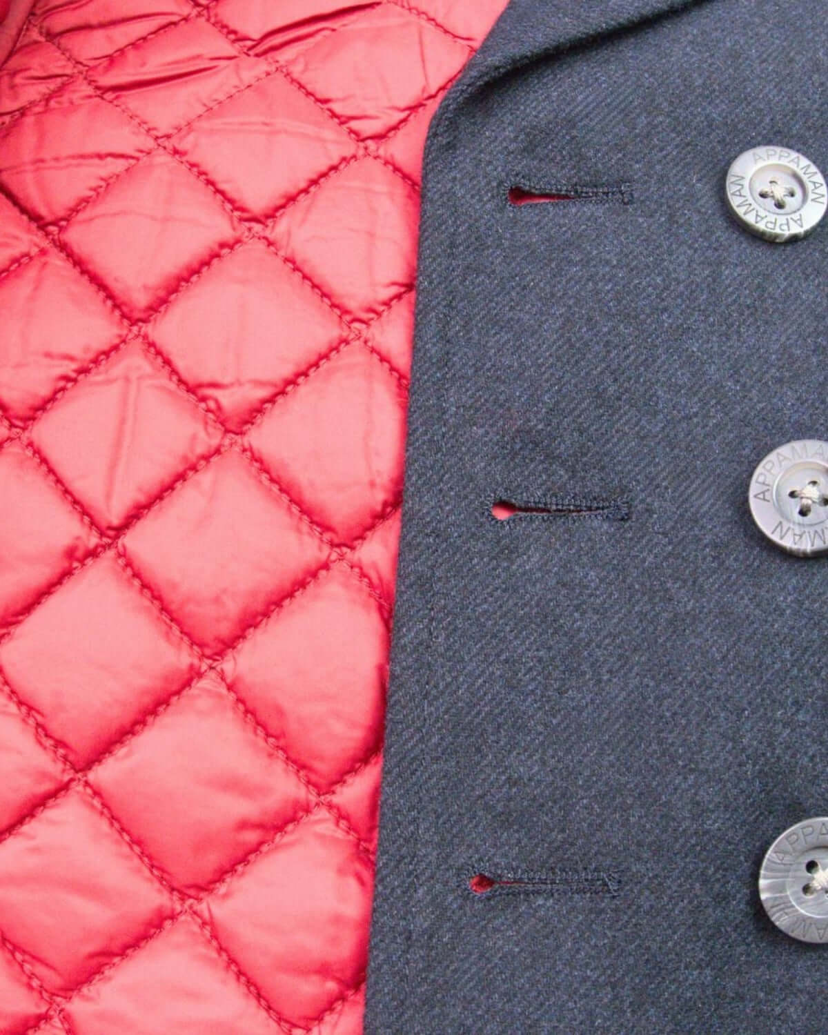 Stylish close-up of the Midnight Navy Pelham Peacoat showcasing cozy red lining—ideal for kids' back-to-school fashion!