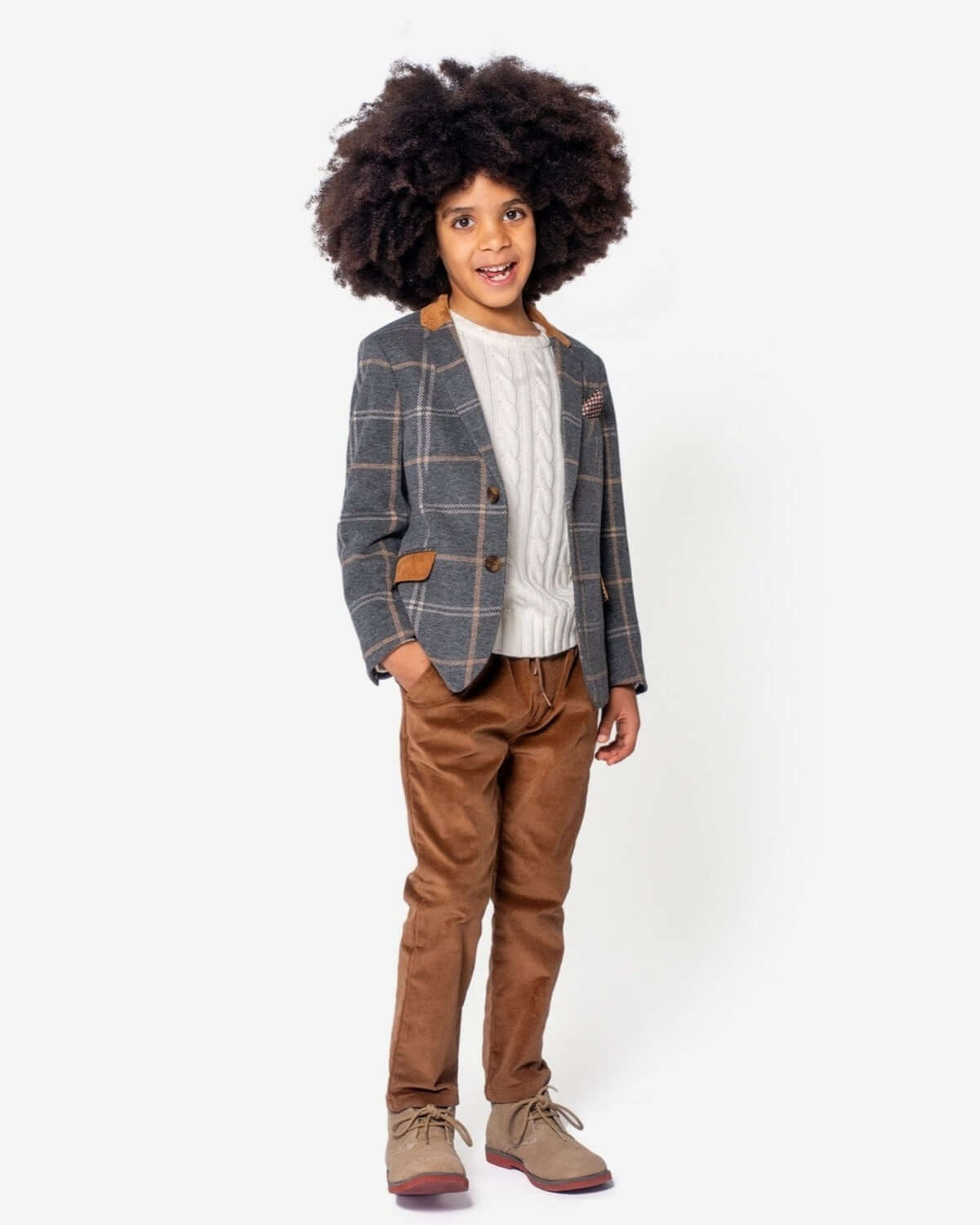 Charming boy in Smoky Windowpane Club Jacket and cozy sweater, showcasing stylish kids clothes for a sophisticated look.
