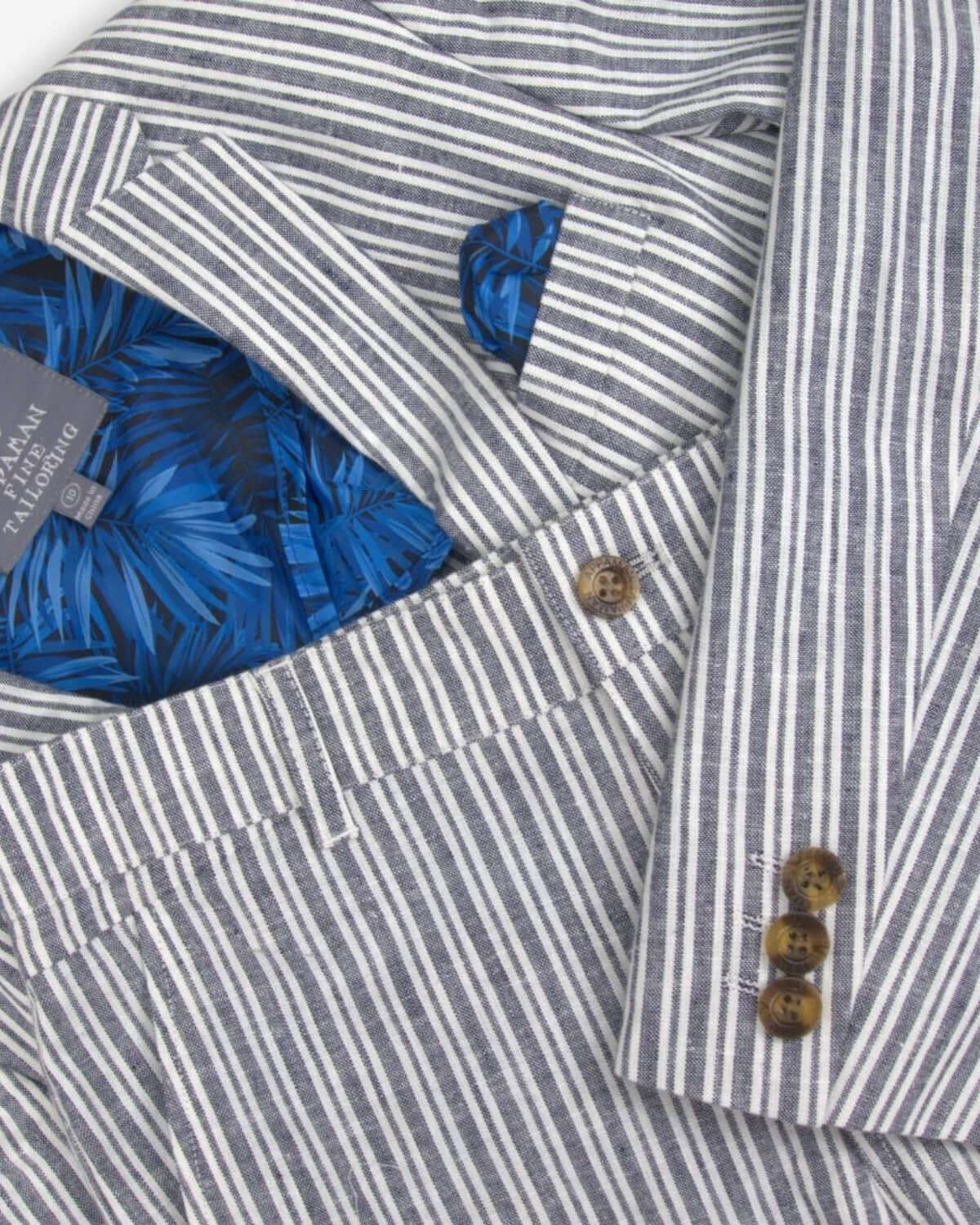 Navy stripe linen sports jacket details with vibrant blue lining, perfect kids clothes for stylish school events and adventures!