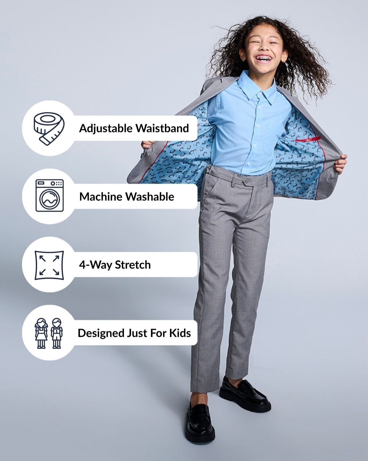Stylish kid showing off slim-fit Mist Suit Pants with adjustable waistband and 4-way stretch for ultimate comfort.