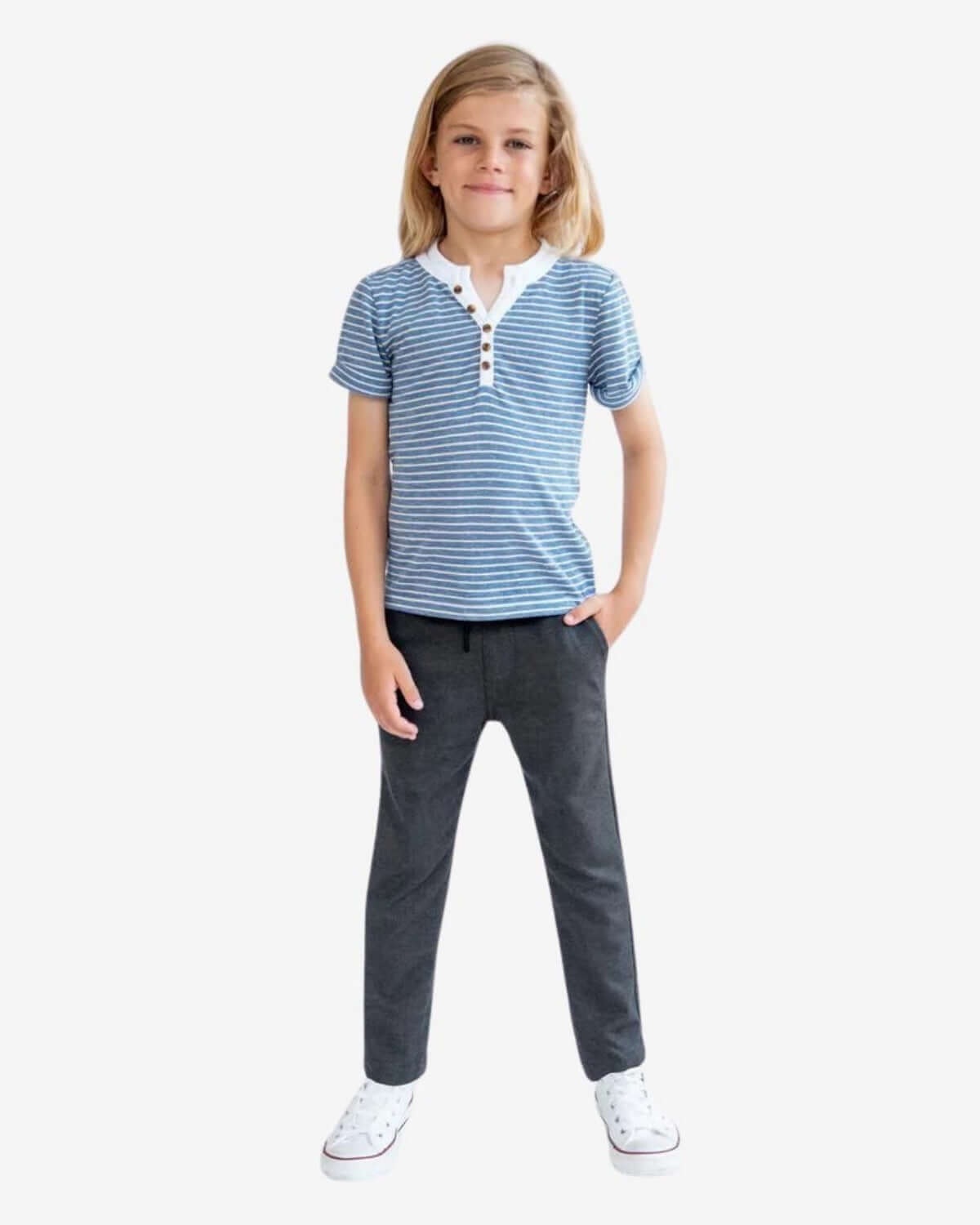 Stylish kid rocking a striped tee and navy stretch joggers—ideal for playdates and back to school adventures!