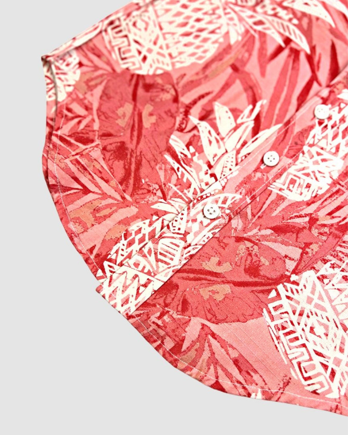 Vibrant coral pineapple print on a stylish kids' shirt—ideal for festive fun or casual outings!