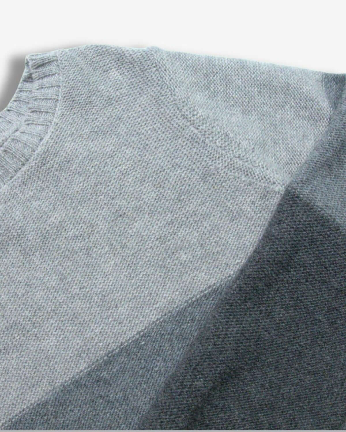Stylish grey ombre Kos sweater showcasing soft fabric and modern design—ideal for boys' winter gatherings and back-to-school adventures.