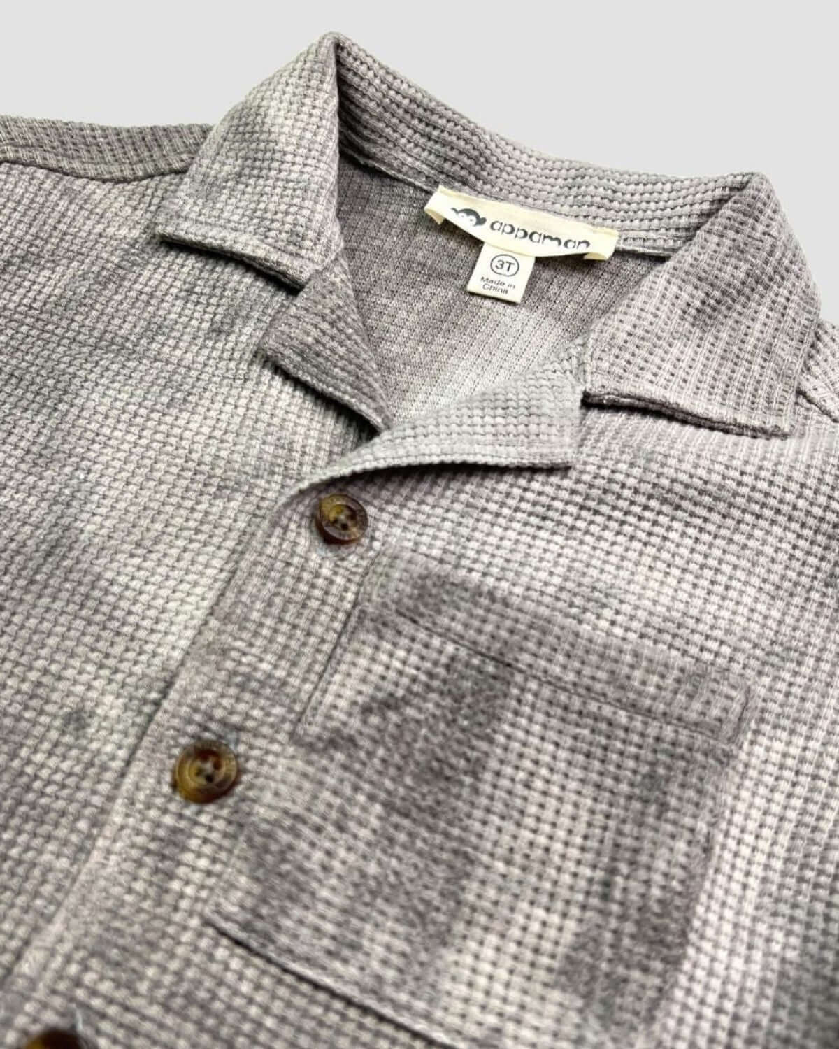 Grey Tie Dye Resort Shirt featuring a collared design and front pocket, perfect for summer wear.