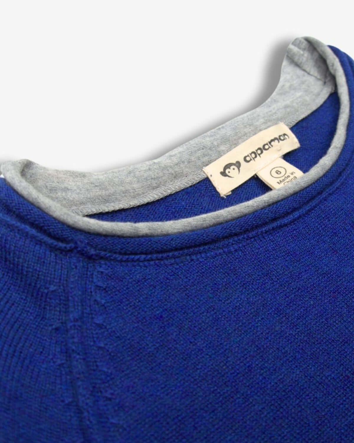 Close-up of the royal blue Jackson Sweater collar showcasing playful sophistication in kids' fashion by Appaman.